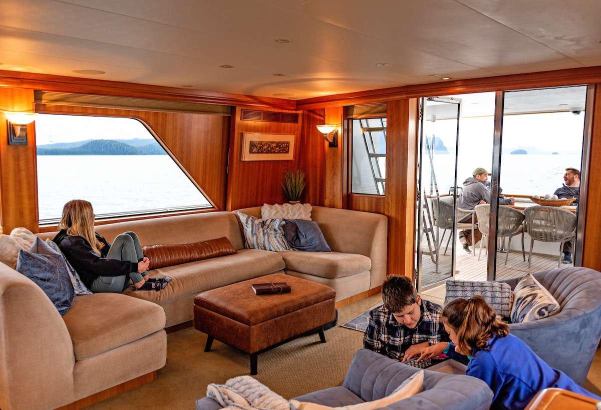 people sitting on a couch aboard DAUNTLESS Yacht for Charter