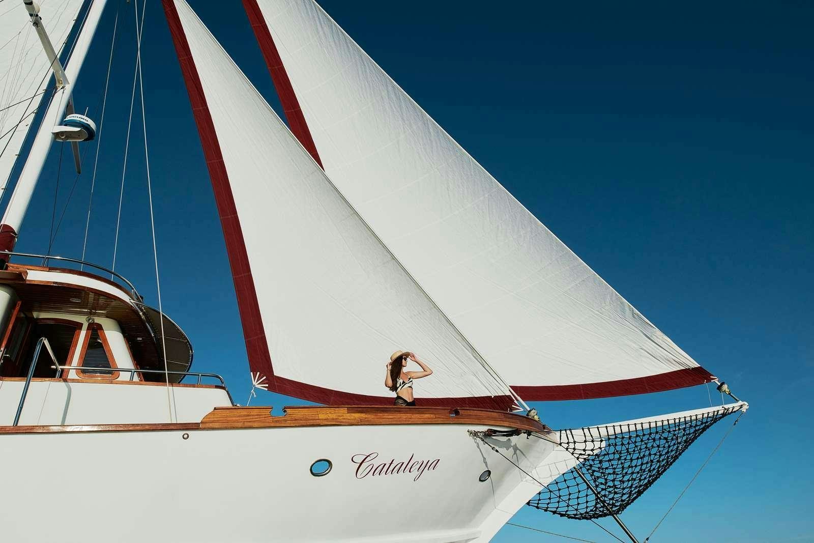 a sailboat in the water aboard CATALEYA Yacht for Charter