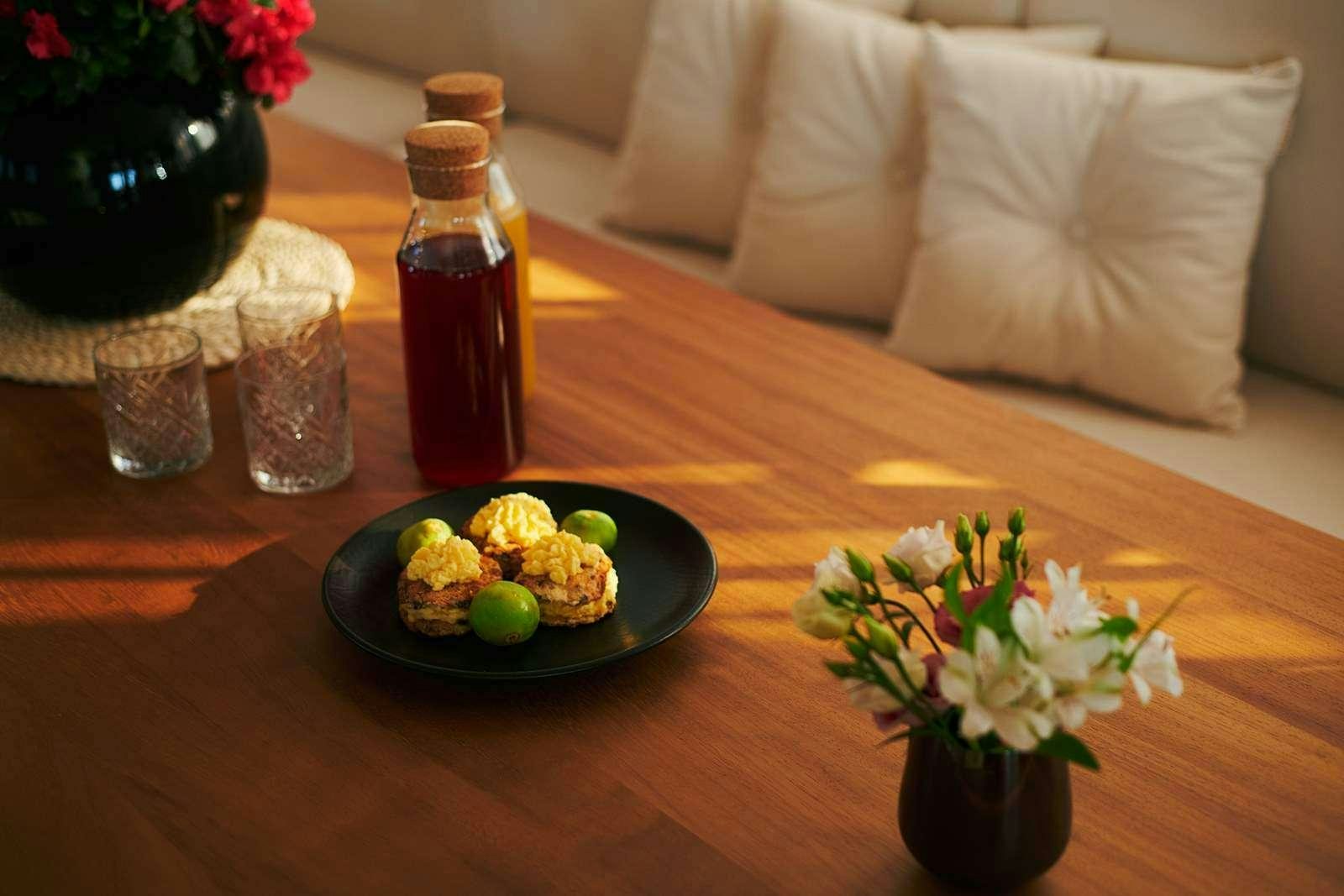 a table with food and drinks aboard CATALEYA Yacht for Charter