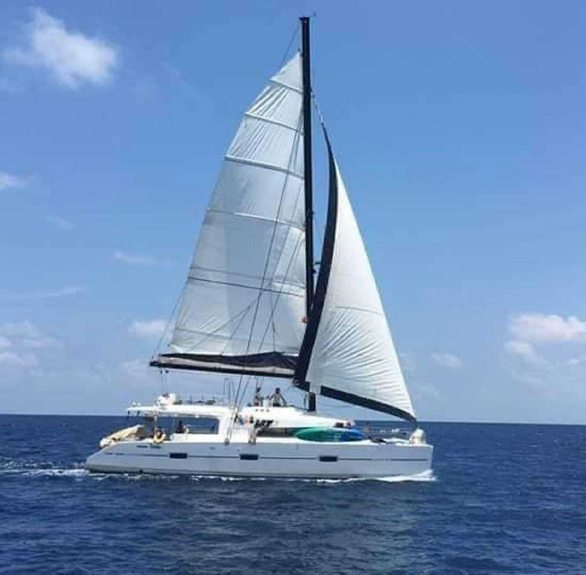 a sailboat on the water aboard DREAM CORSICA Yacht for Charter