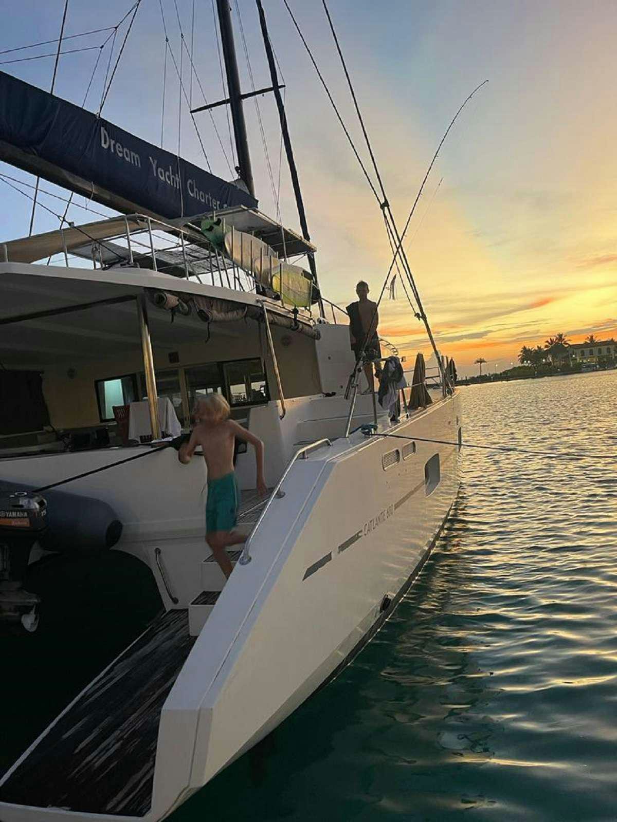 a person standing on a boat aboard DREAM CORSICA Yacht for Charter