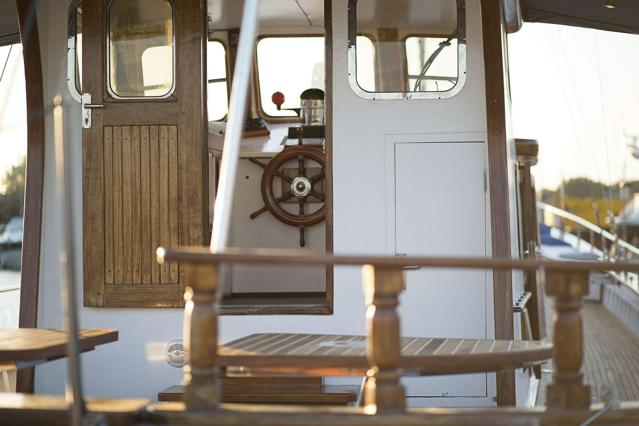 a train car with a steering wheel aboard COSMOS Yacht for Charter
