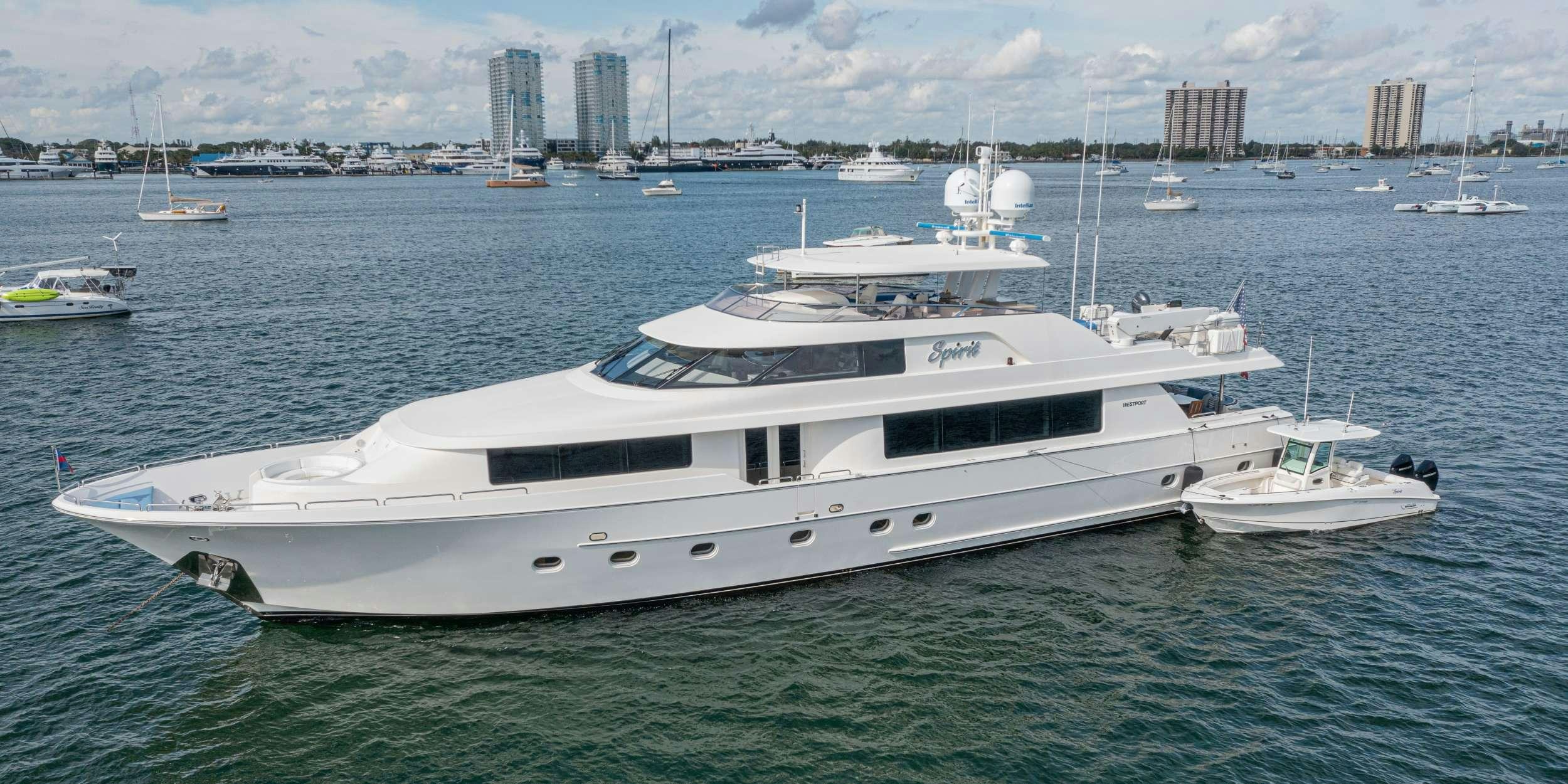 a large white boat in the water aboard SPIRIT Yacht for Charter