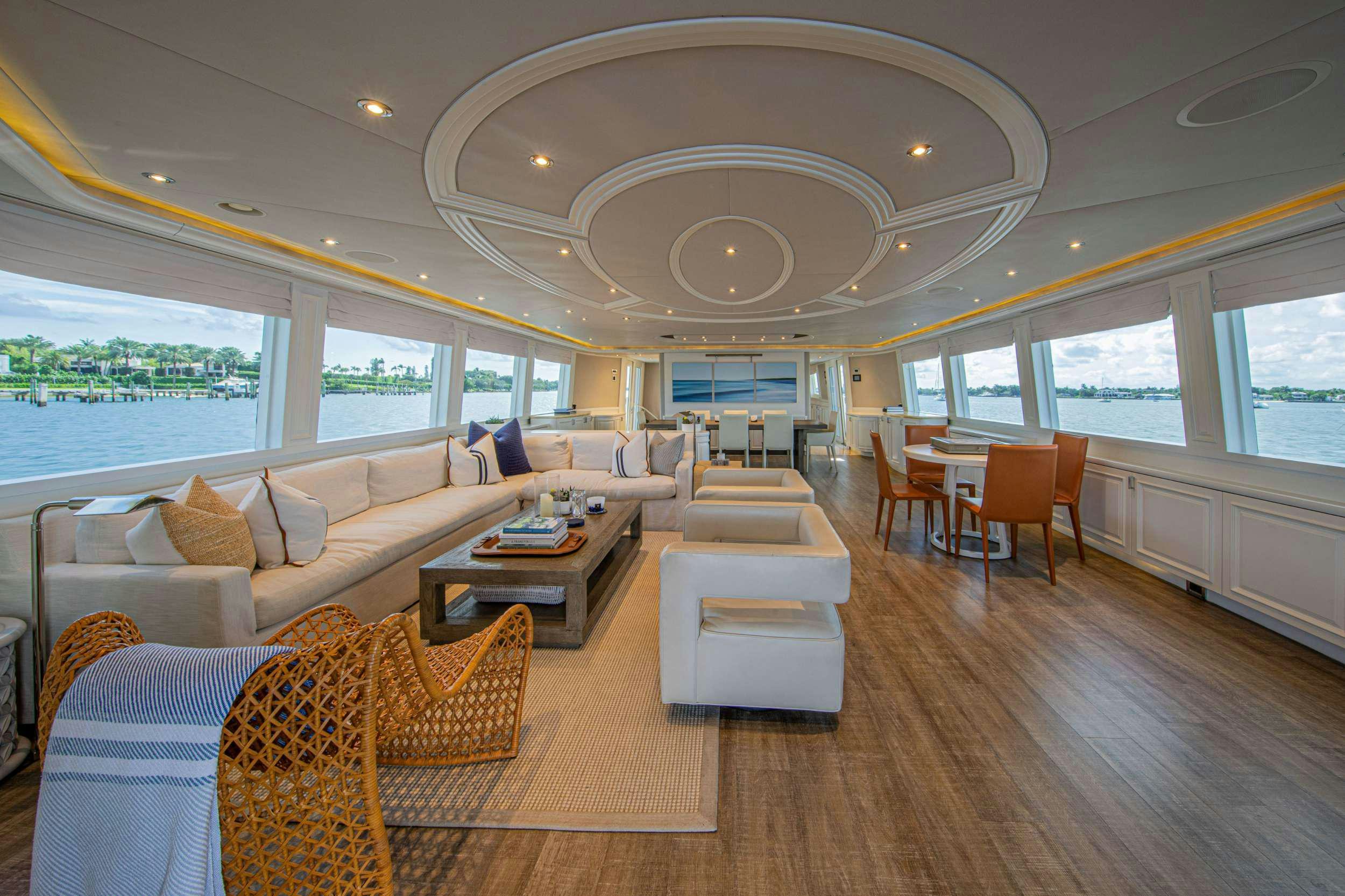a living room with a large window aboard SPIRIT Yacht for Charter