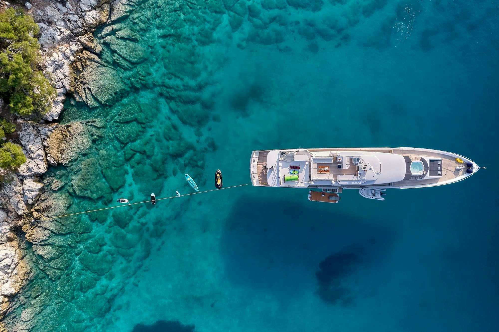 a person on a boat in the water aboard ALAYA Yacht for Charter