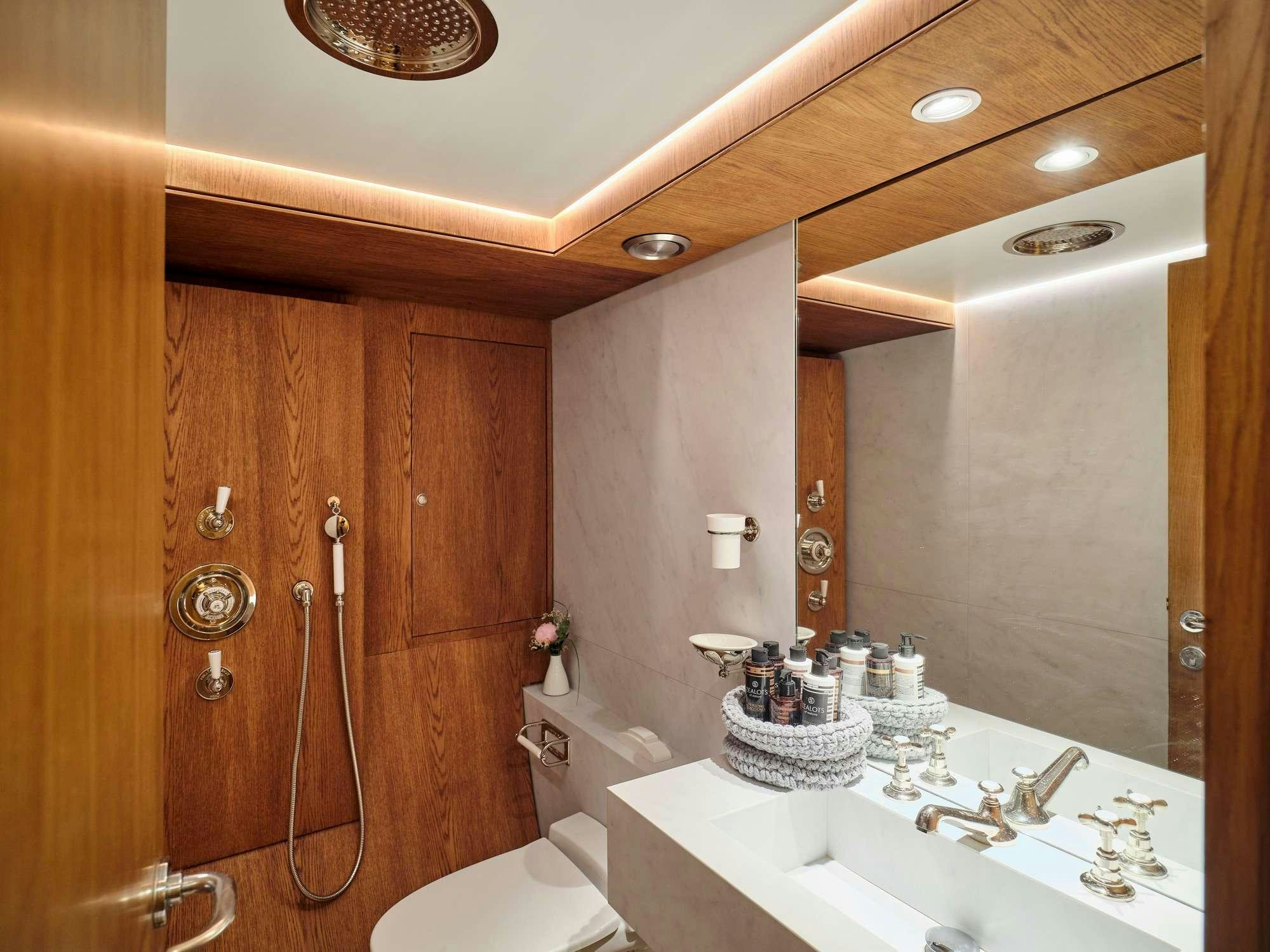a bathroom with a sink and toilet aboard ALAYA Yacht for Charter