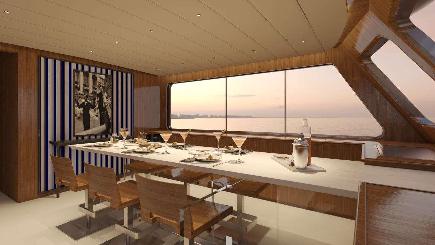 a large room with a table and chairs aboard ALAYA Yacht for Charter