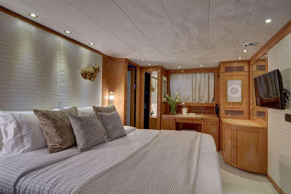 a bed in a room aboard KARMA Yacht for Charter