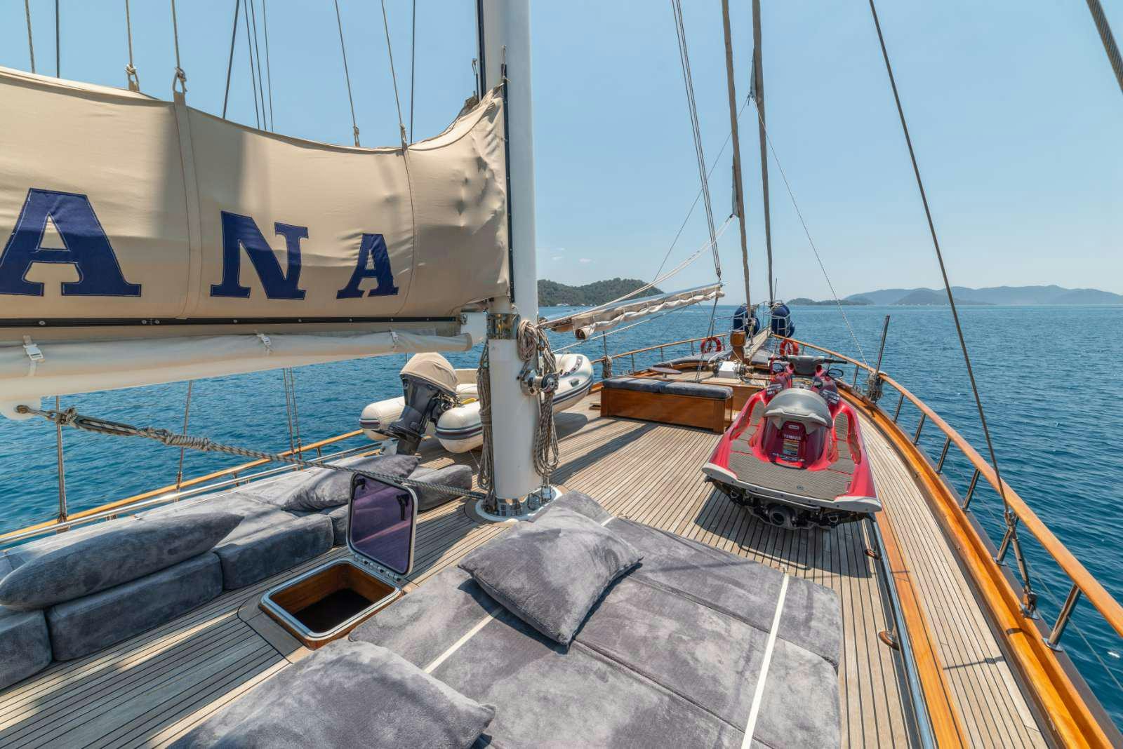 a boat docked at a pier aboard SEMA TUANA Yacht for Charter