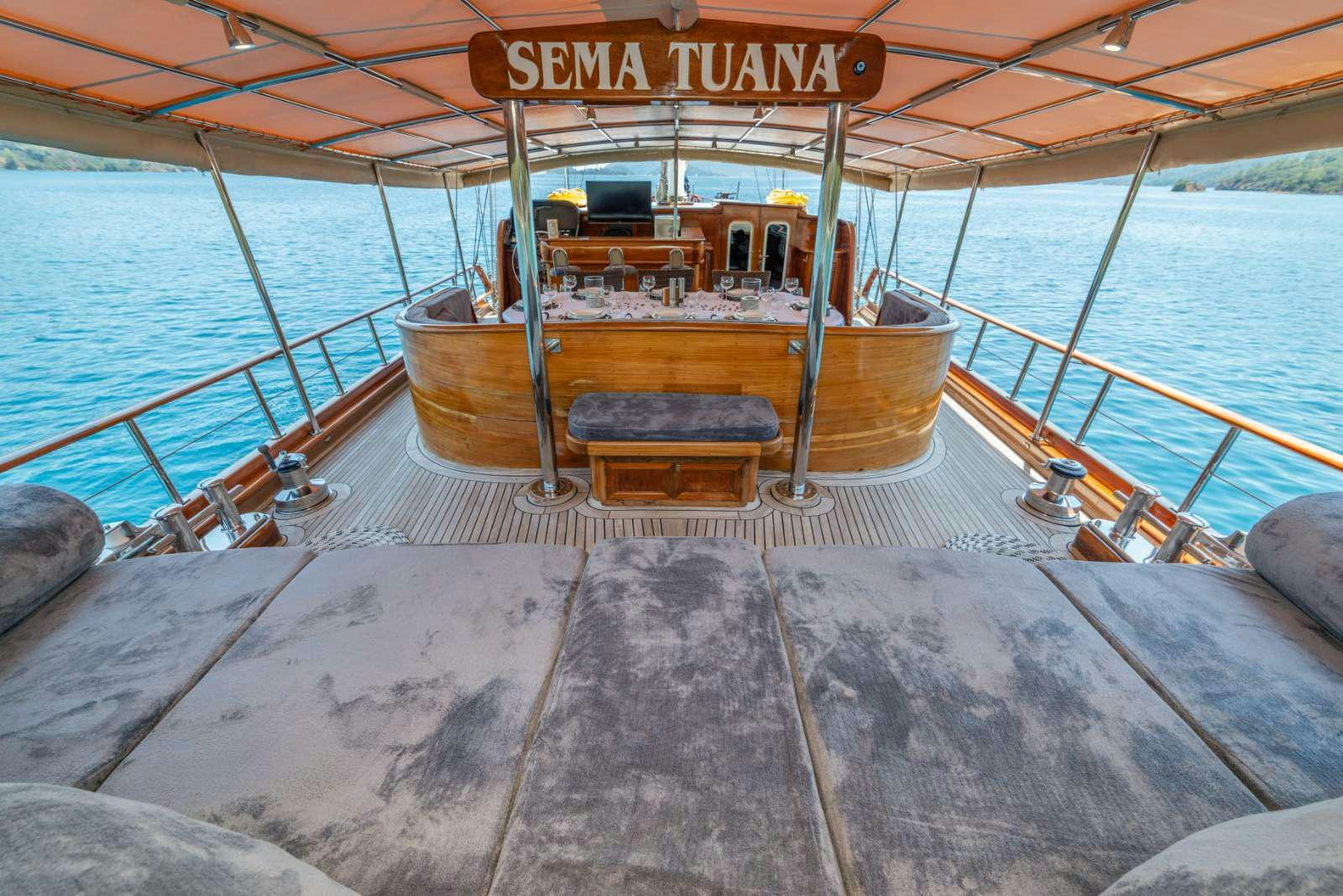 a boat on a rock aboard SEMA TUANA Yacht for Charter