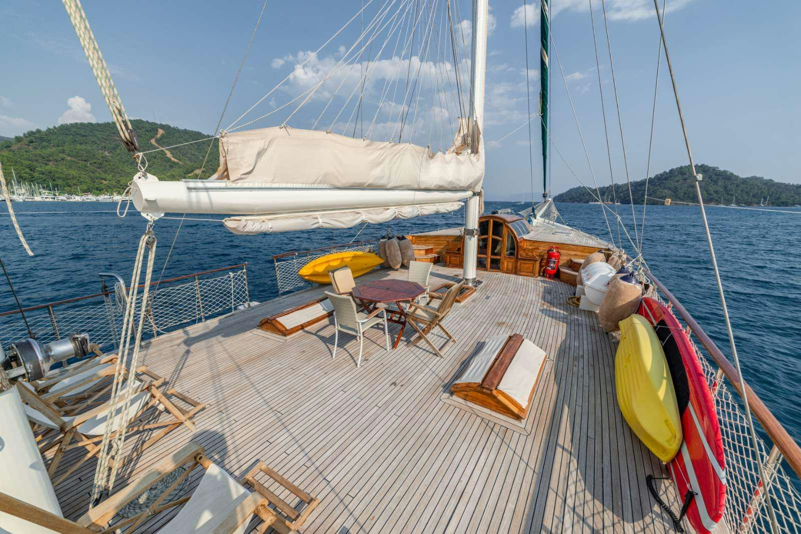 a boat docked at a pier aboard AMAZON SOLO Yacht for Charter