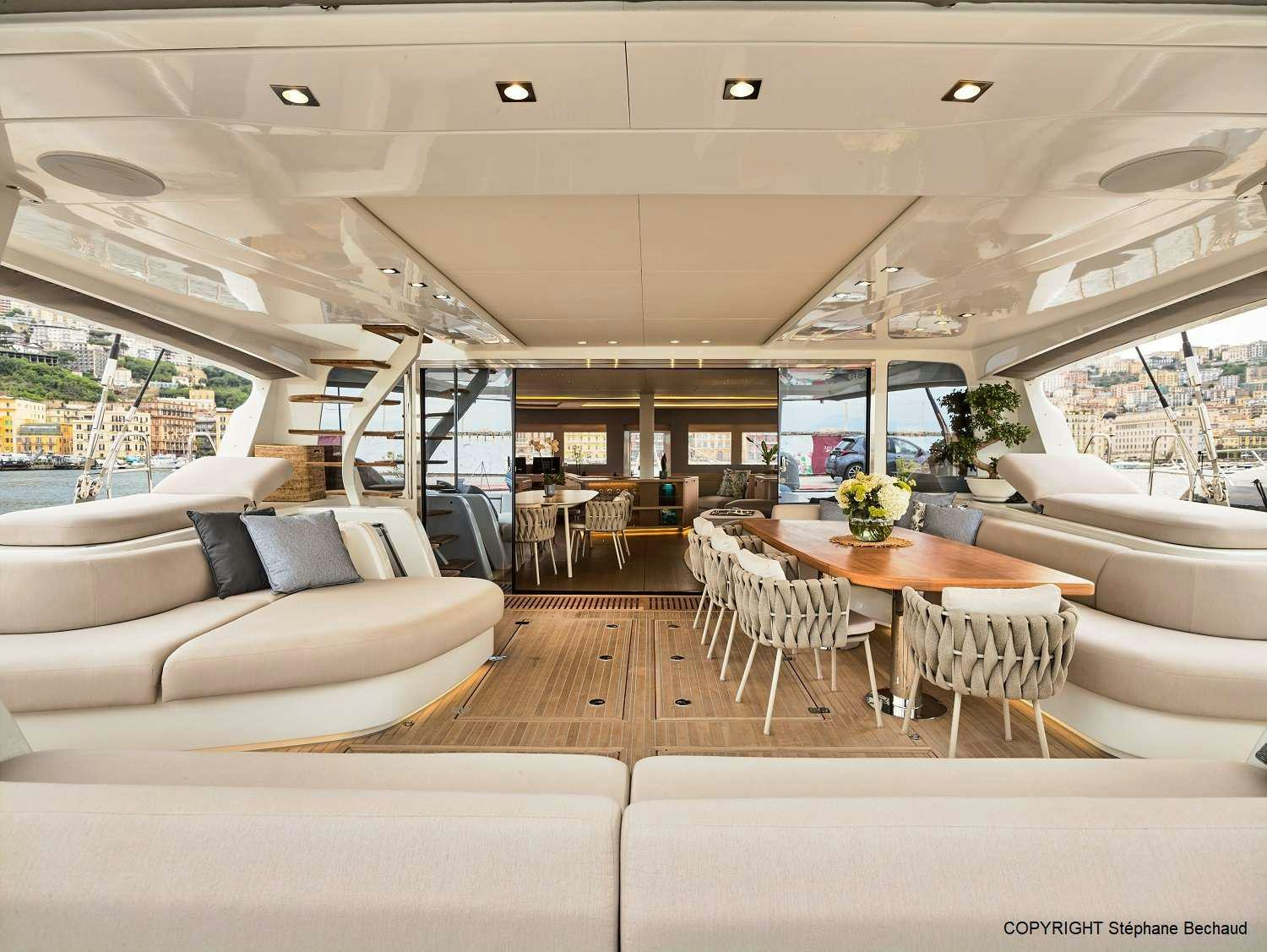 a modern looking living room aboard KAJIKIA Yacht for Charter