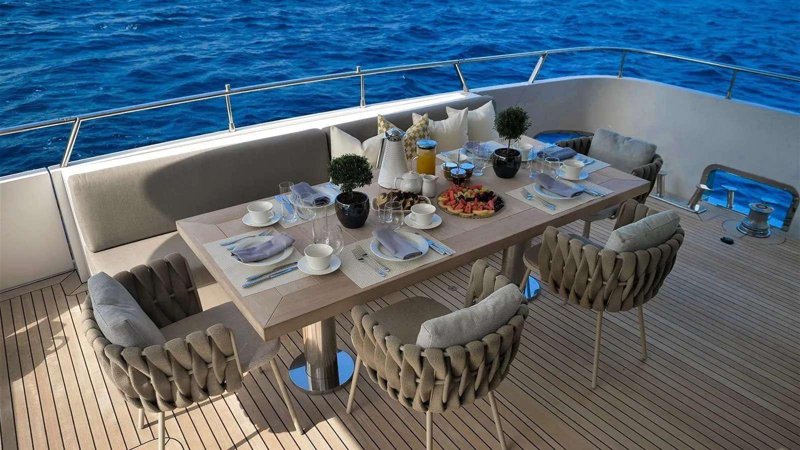 a table on a boat aboard MILGAUSS Yacht for Charter