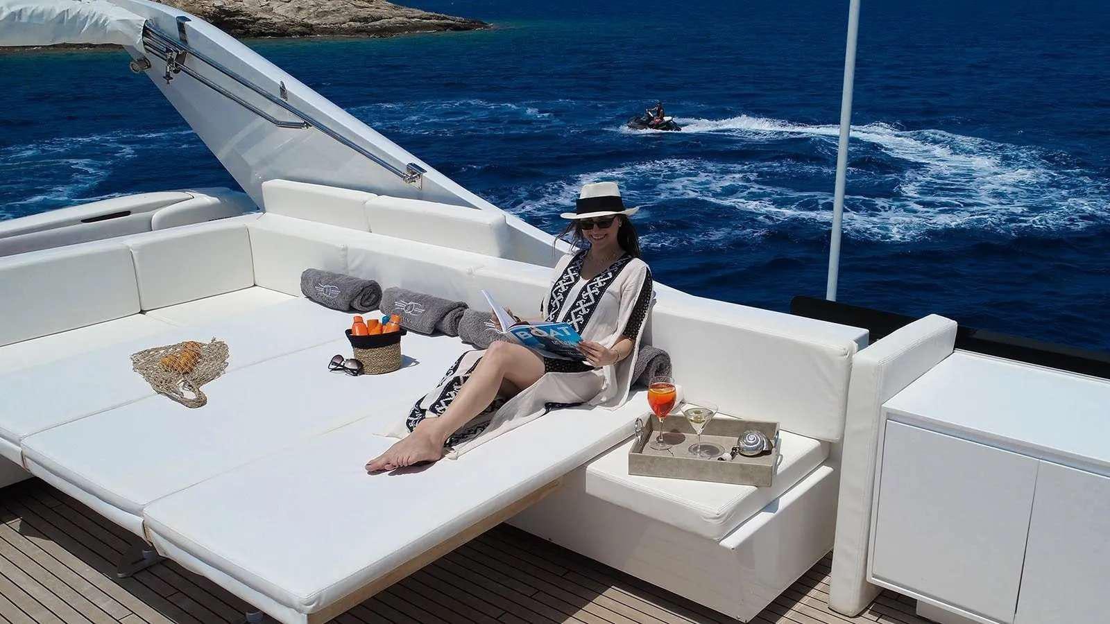 a person sitting on a boat aboard MILGAUSS Yacht for Charter