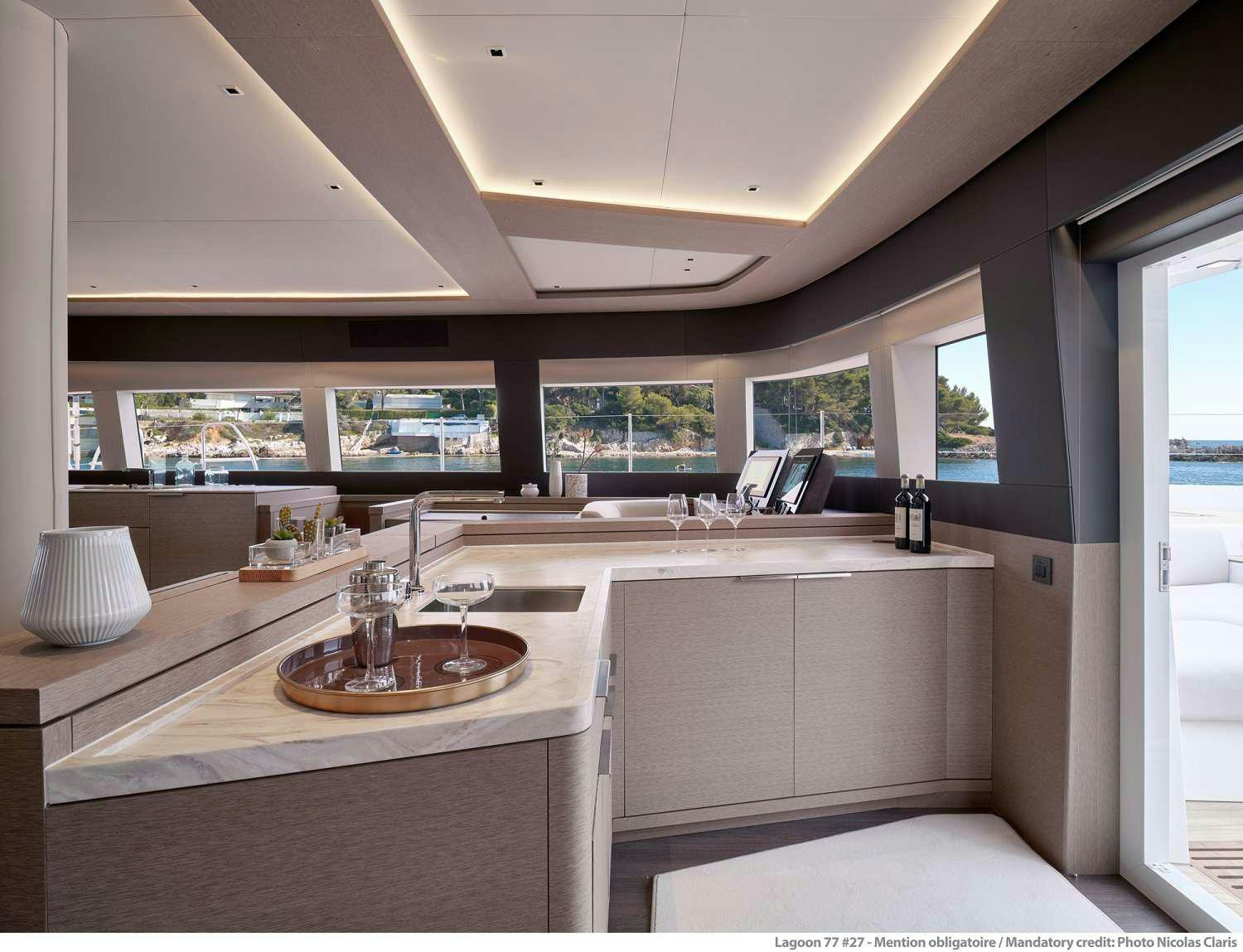 a kitchen with a large island aboard SYLENE Yacht for Charter
