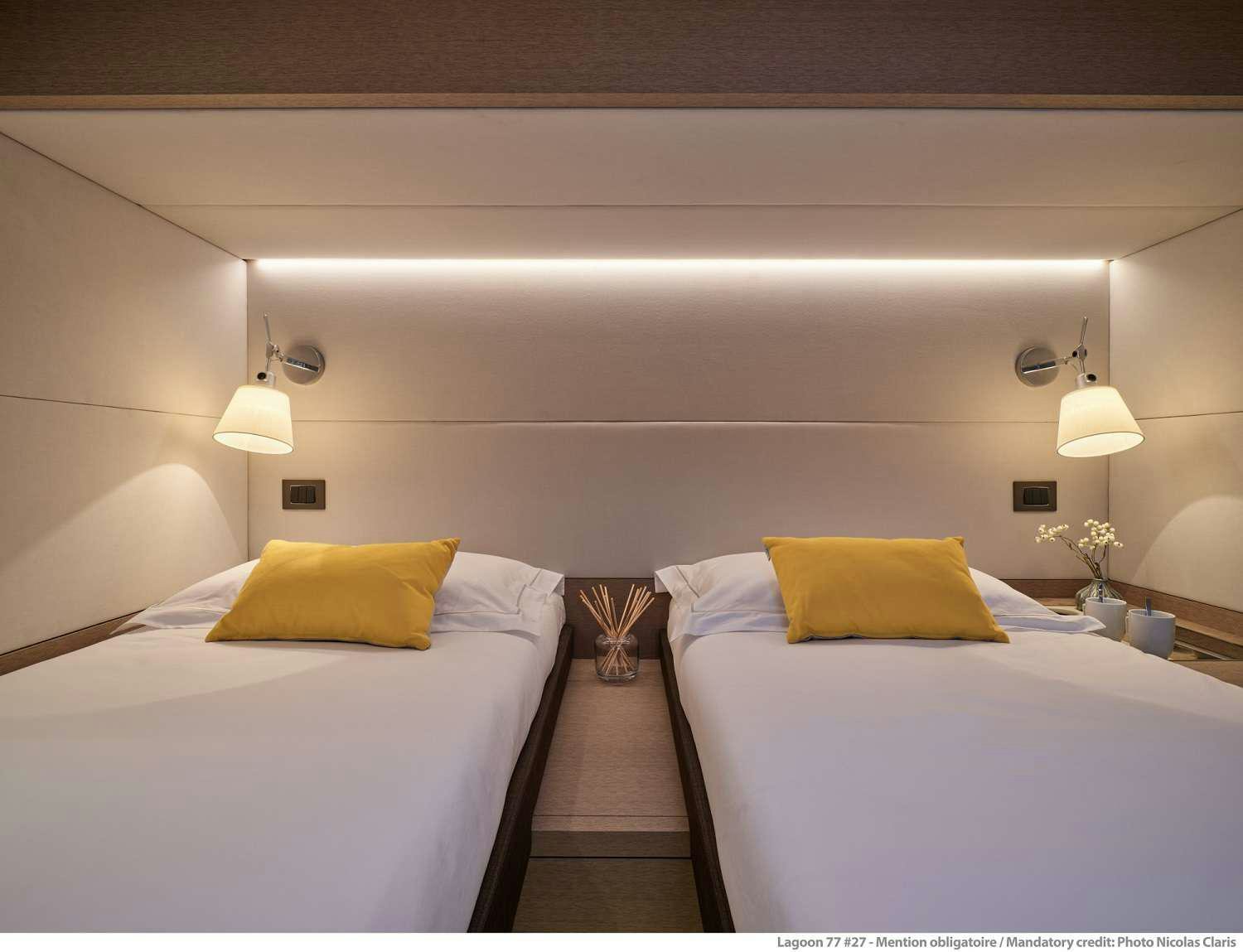 a room with two beds aboard SYLENE Yacht for Charter