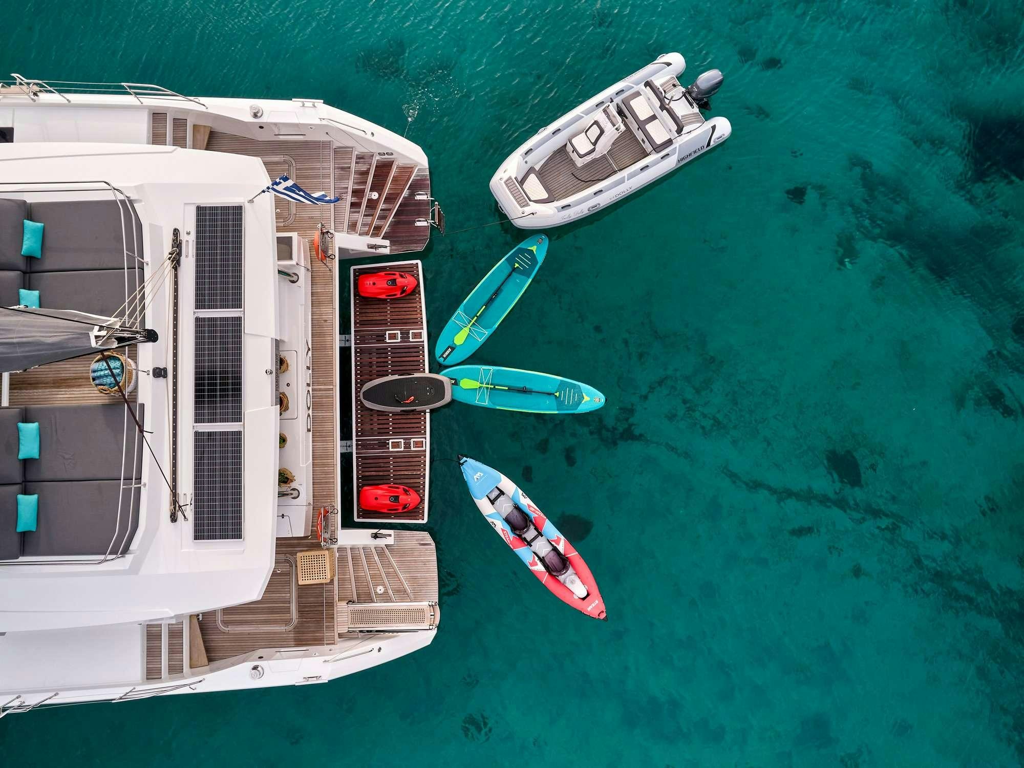 a group of boats on the water aboard DOLLY Yacht for Charter