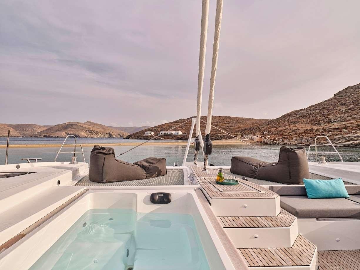 a person lying on a boat aboard DOLLY Yacht for Charter