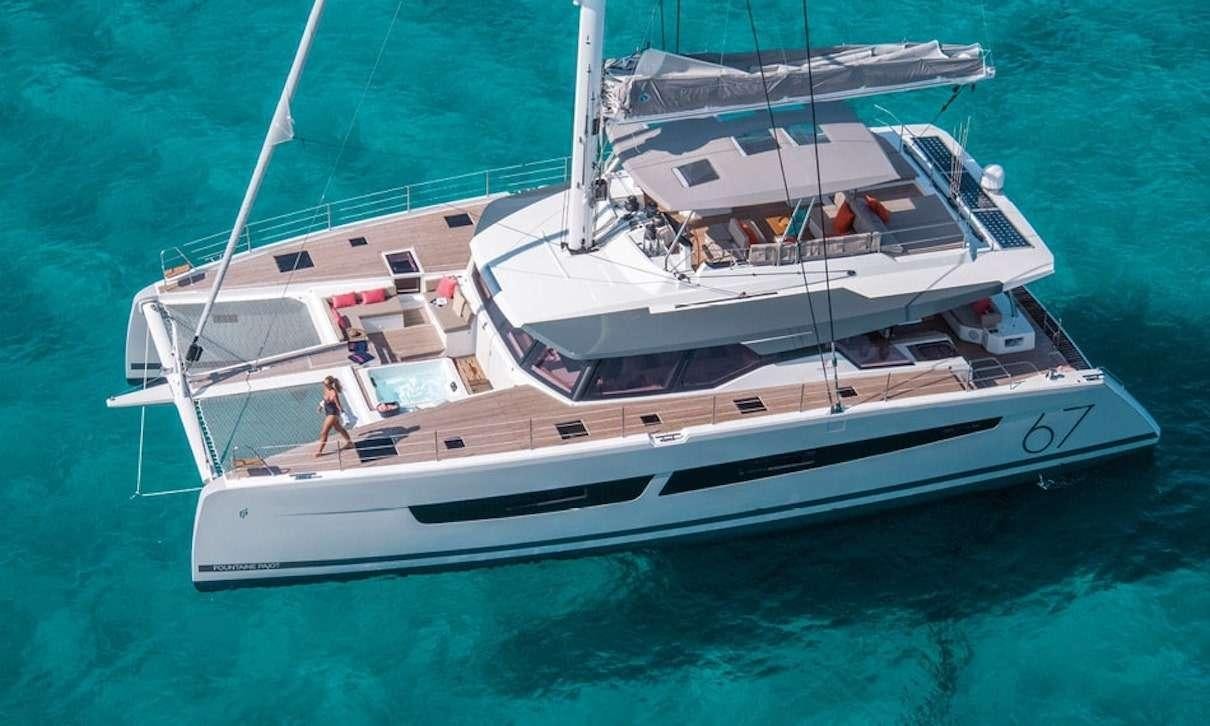 a white boat in the water aboard INDULGENCE Yacht for Charter