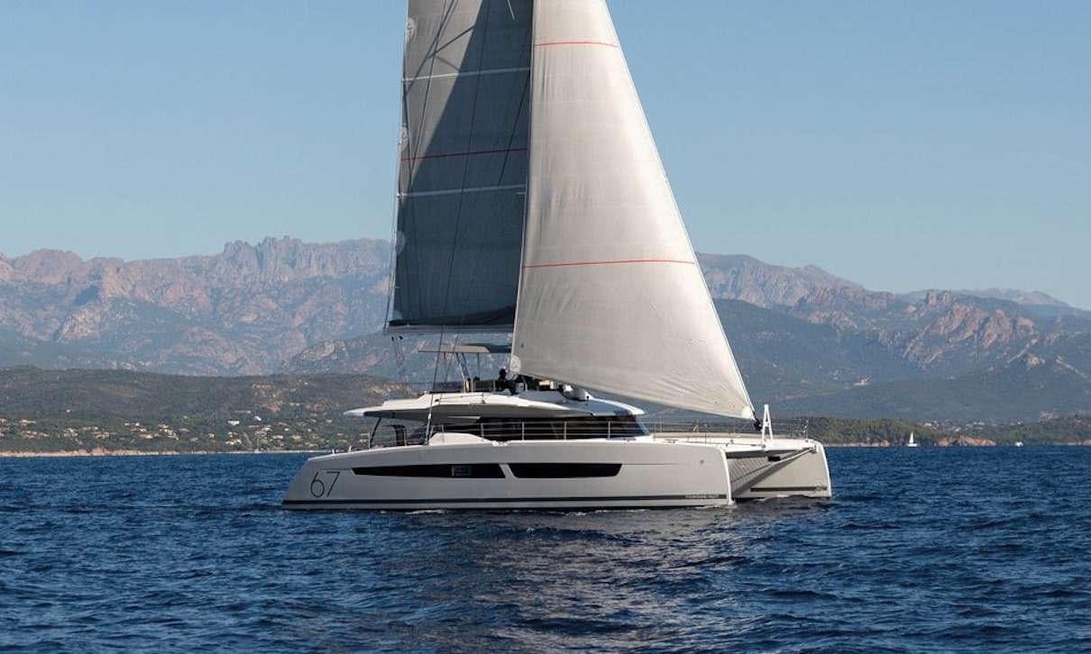a white boat on the water aboard INDULGENCE Yacht for Charter