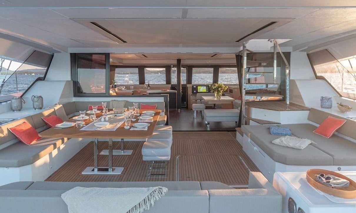 a room with a large window aboard INDULGENCE Yacht for Charter