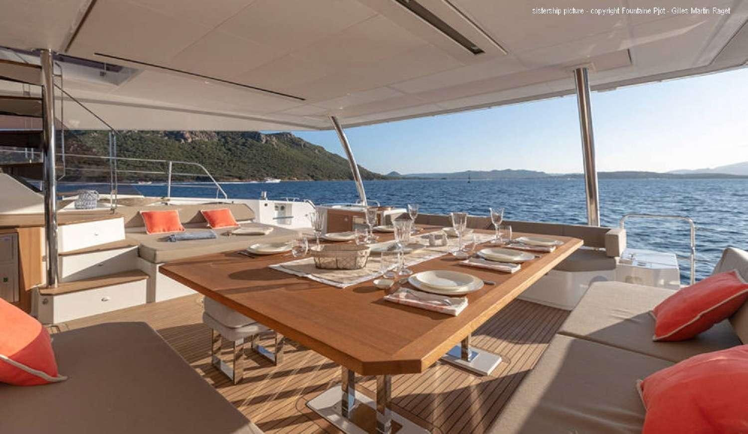 a table on a boat aboard LOOMA Yacht for Charter