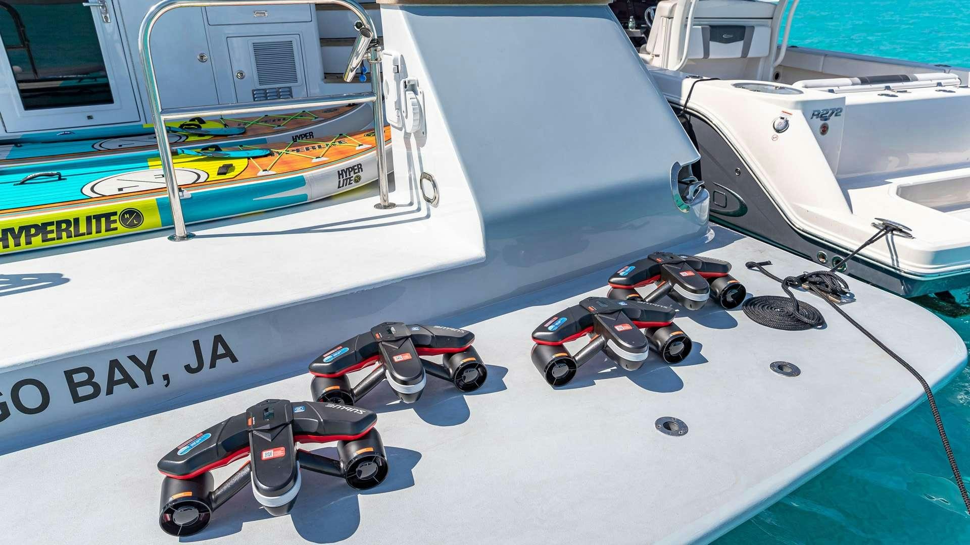 a group of race cars on a race track aboard WHITE PEARL Yacht for Charter