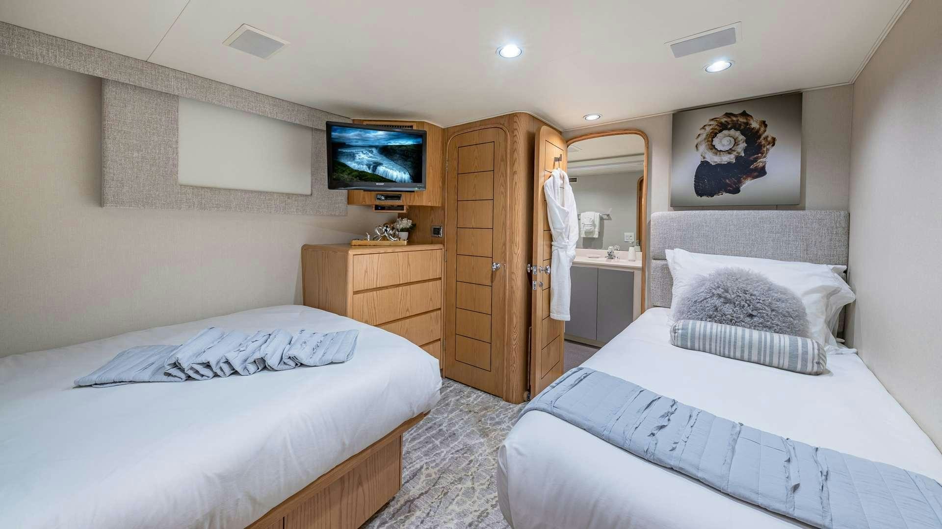a room with two beds aboard WHITE PEARL Yacht for Charter