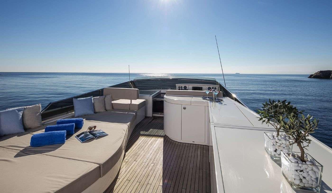 a balcony with a view of the ocean and the ocean aboard MYTHOS Yacht for Charter