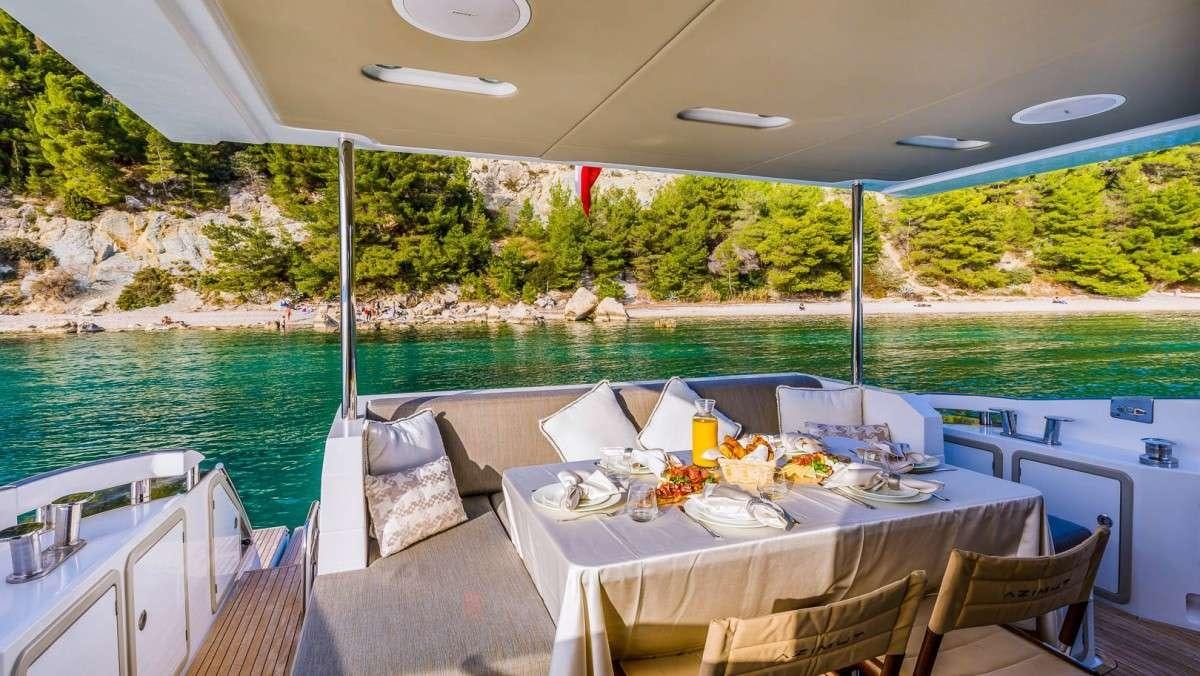 a table with food on it aboard KARAT II Yacht for Charter