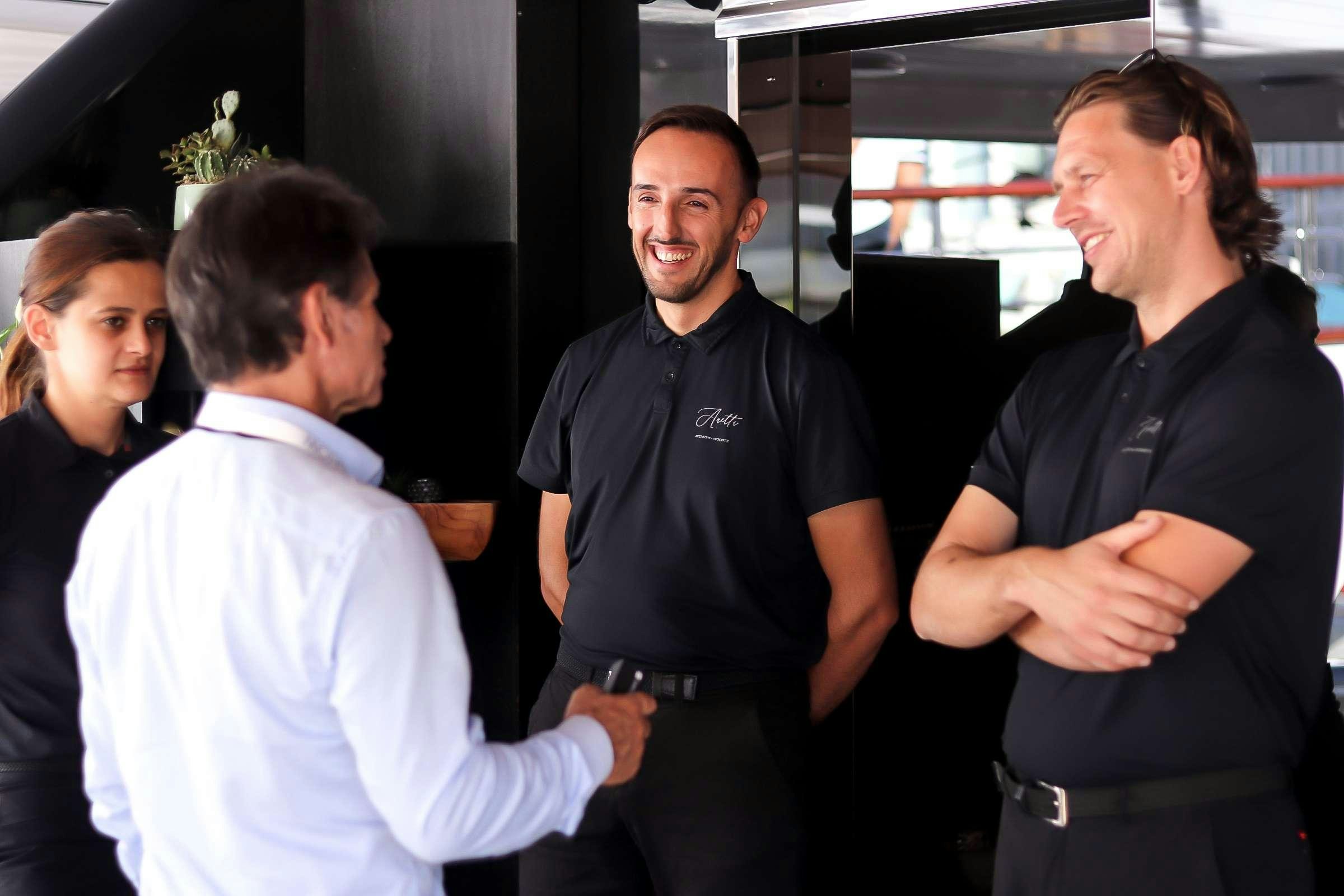 a group of people laughing aboard ANETTA Yacht for Charter
