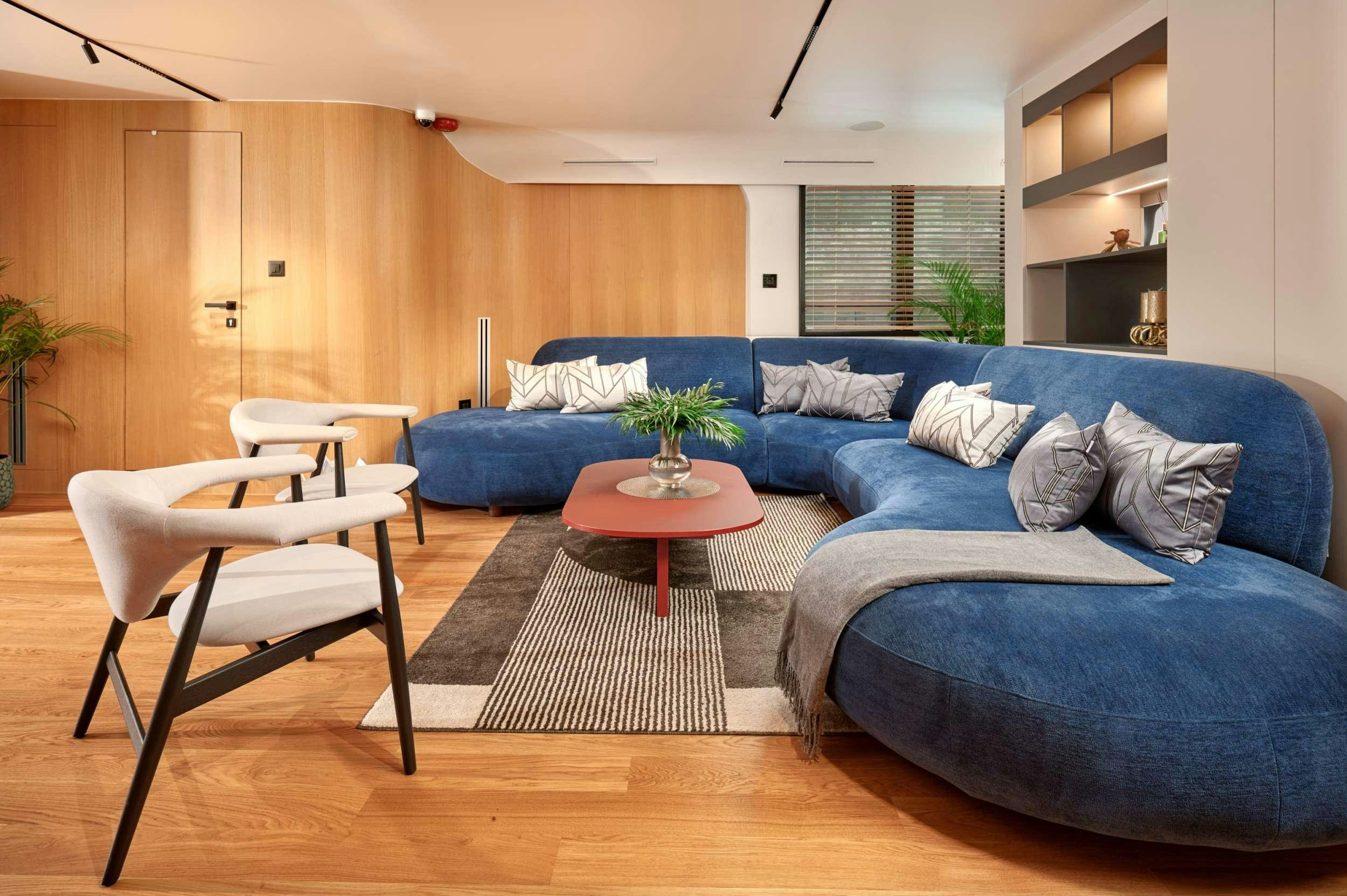 a living room with a couch and a table aboard ANETTA Yacht for Charter