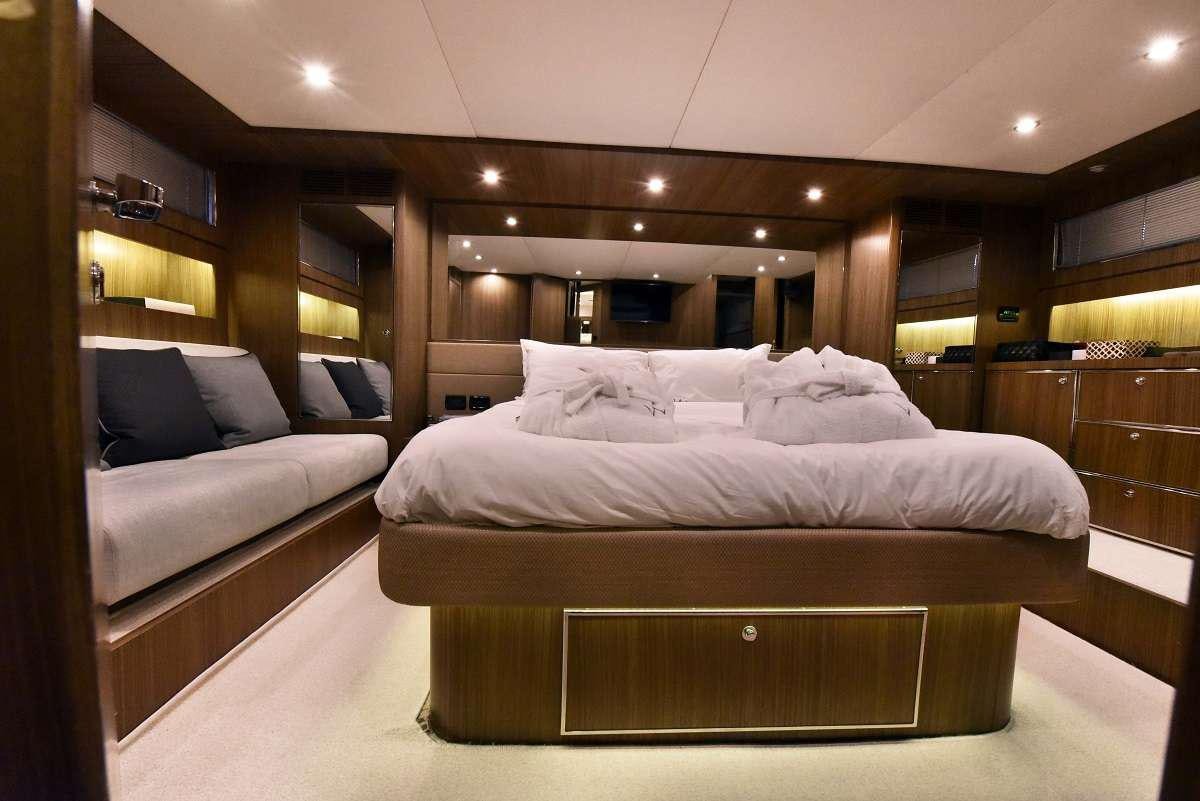 a bed in a room aboard W Yacht for Charter