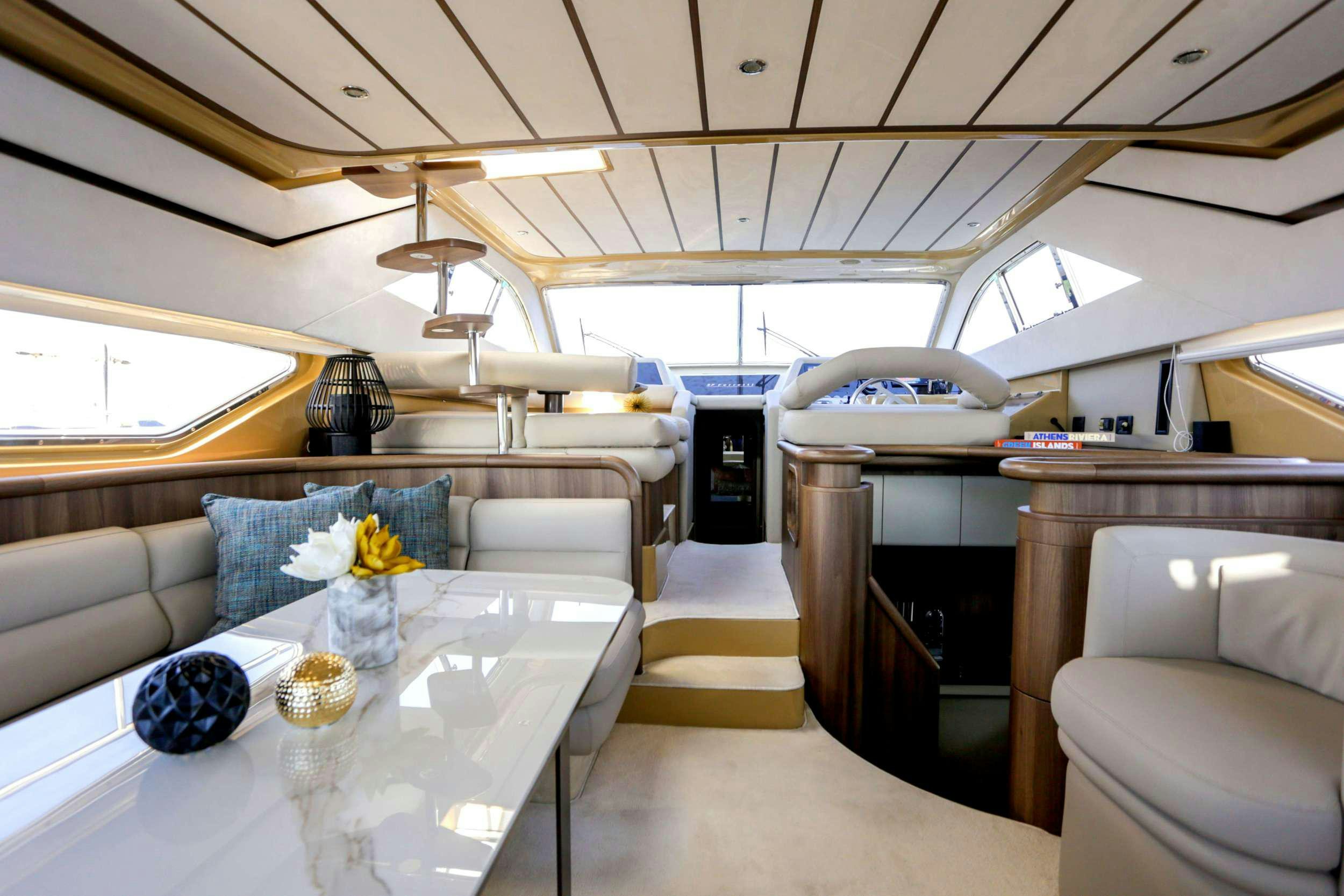 a room with a table and chairs aboard SUMMER CAMP Yacht for Charter