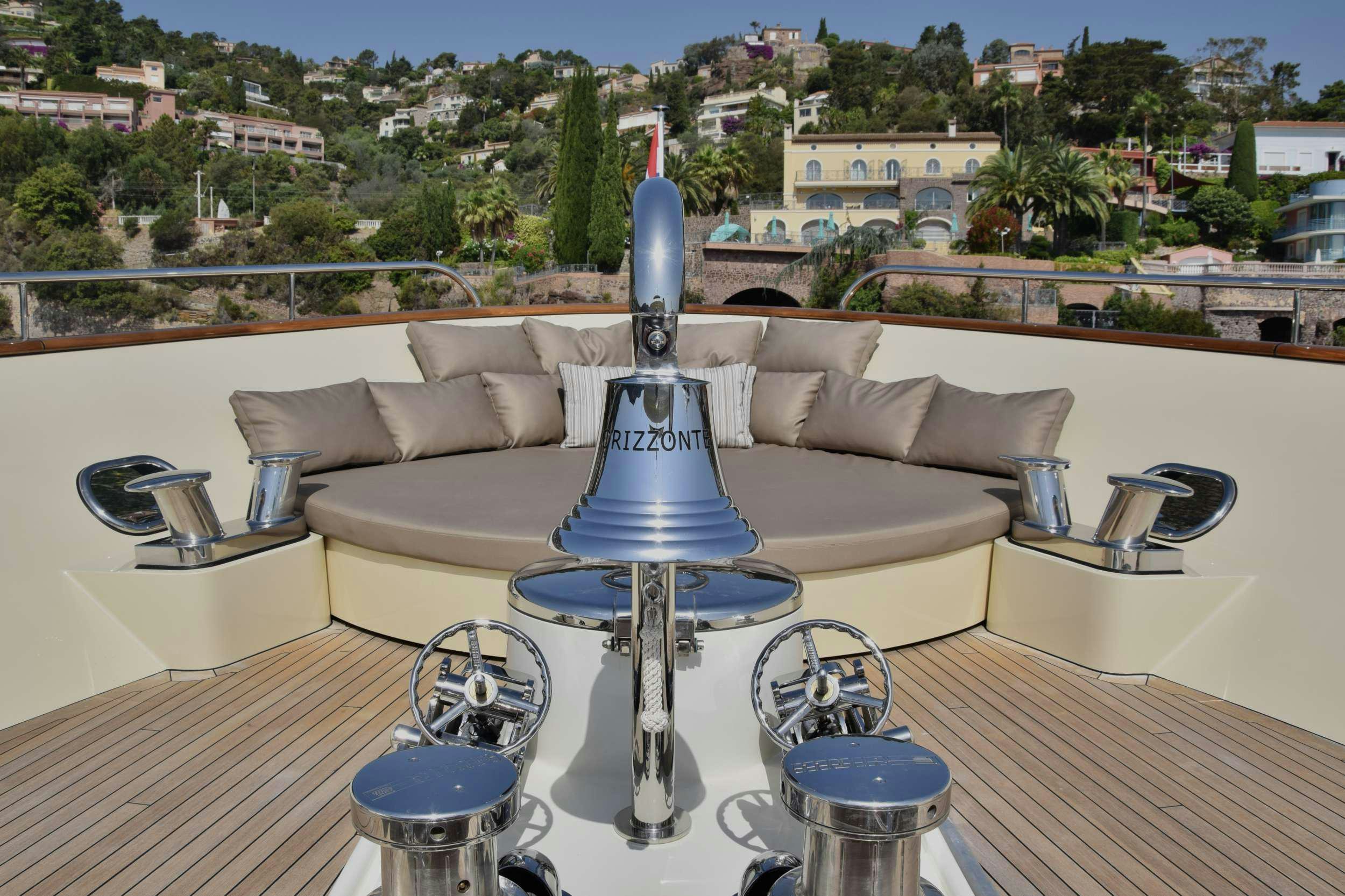a large blue lamp on a table aboard ORIZZONTE Yacht for Charter
