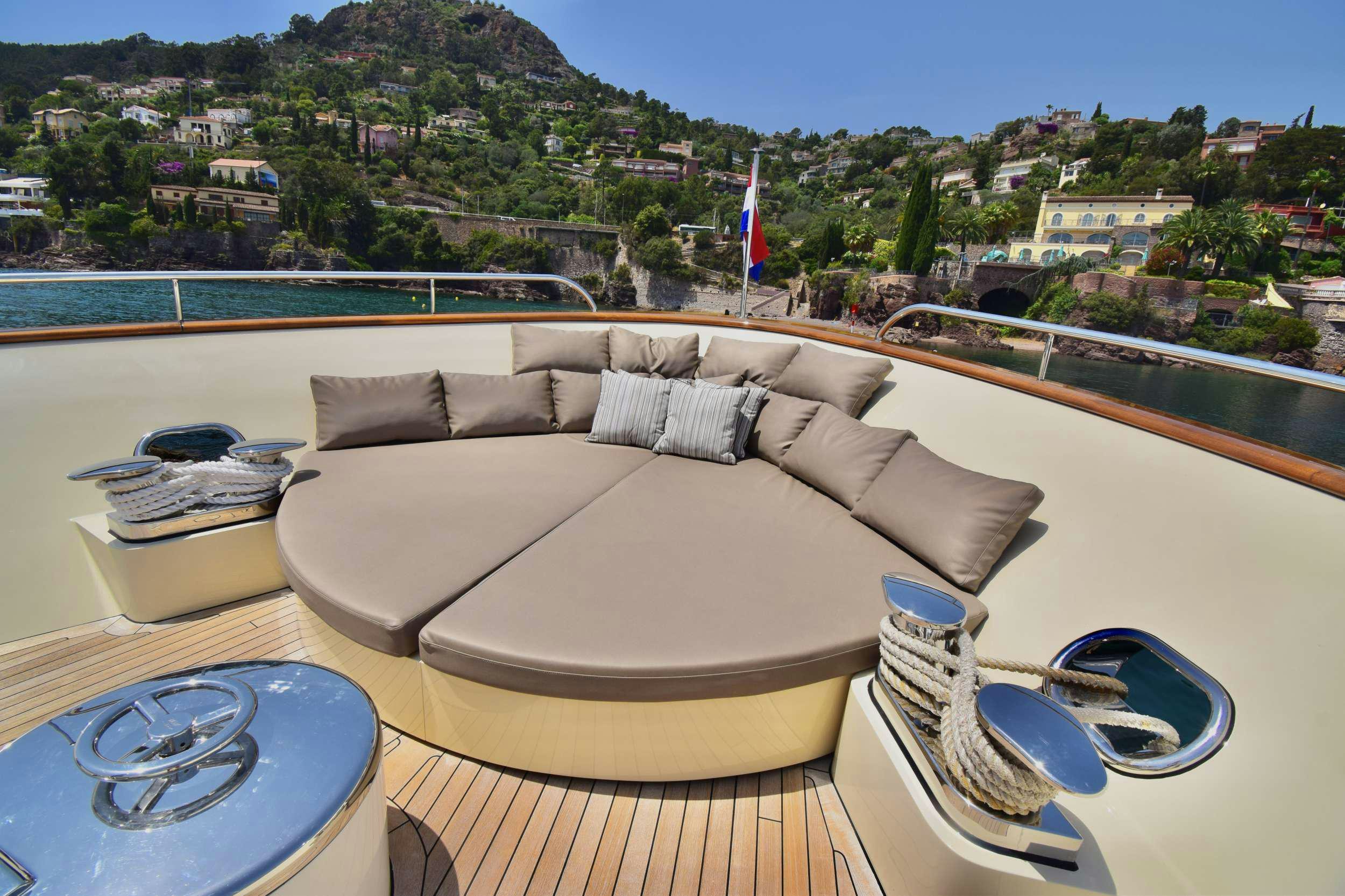 a couch on a table aboard ORIZZONTE Yacht for Charter