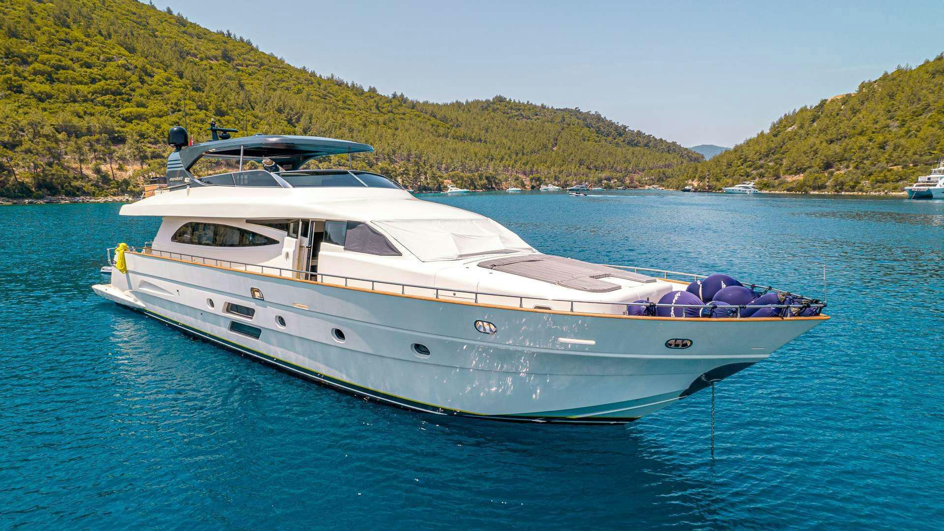 a white yacht in the water aboard LIBERATA Yacht for Charter