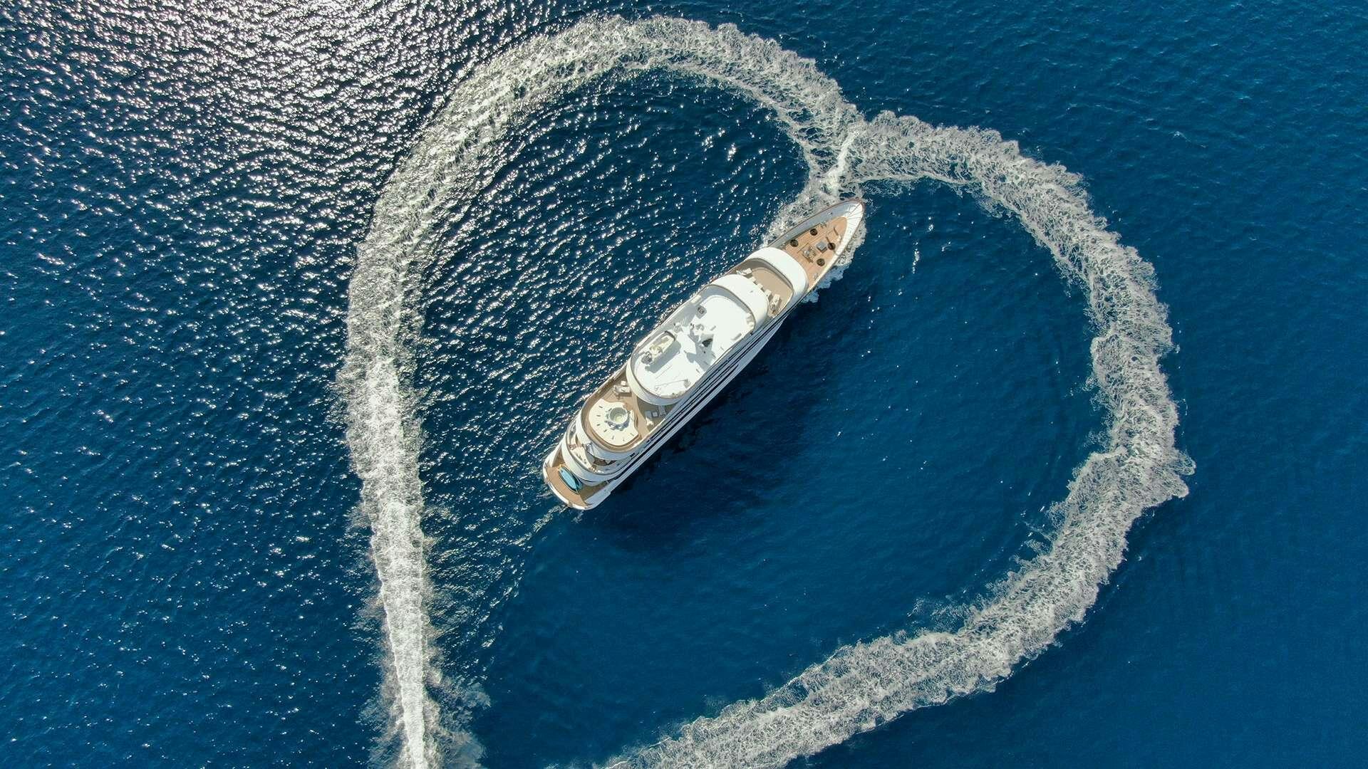 a silver and gold ring on a blue surface aboard M/Y ANTHEA Yacht for Charter