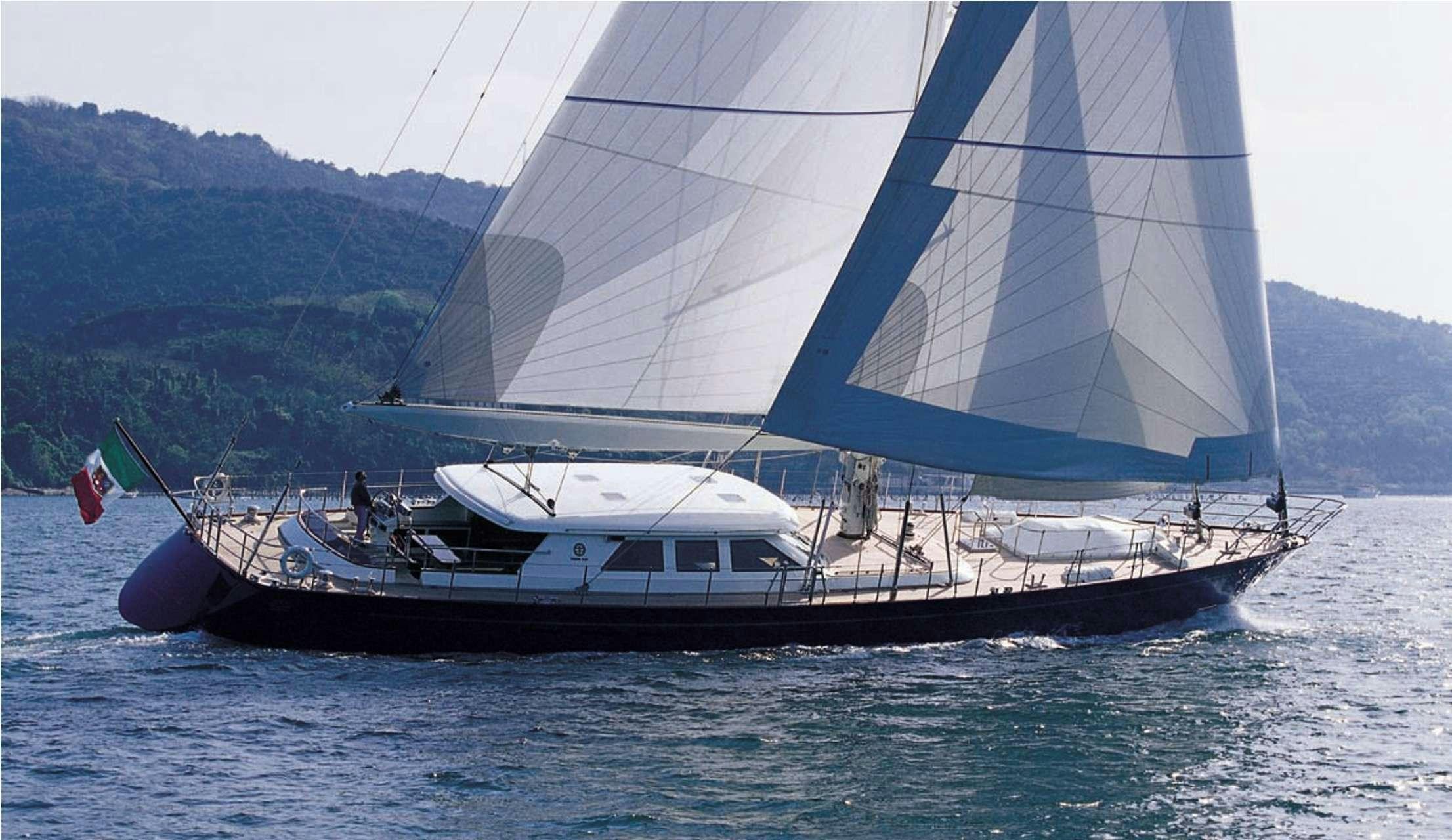 a boat sailing on the sea aboard HERITAGE M Yacht for Charter
