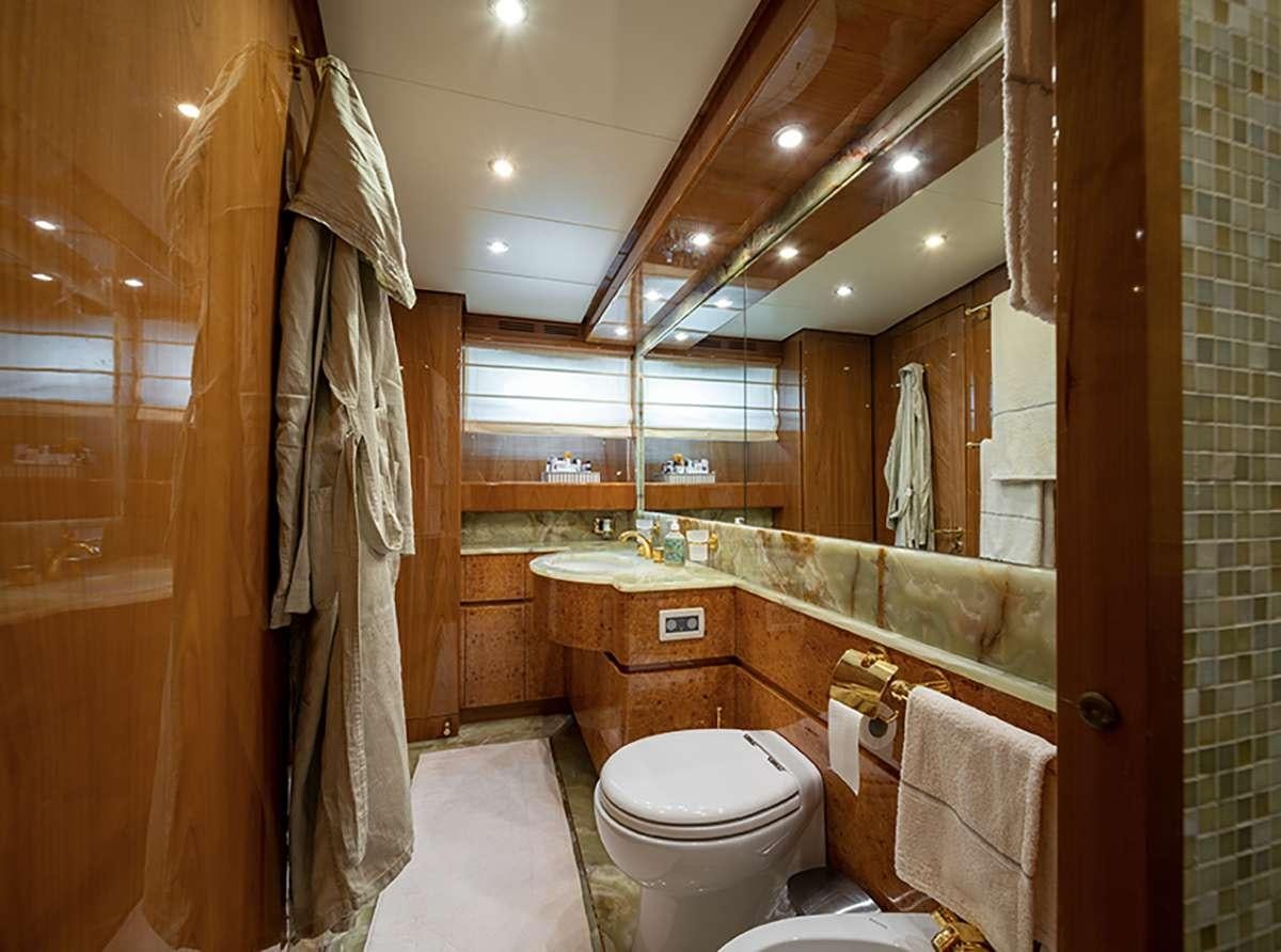 a bathroom with a large mirror aboard GOLDEN EAGLE Yacht for Charter