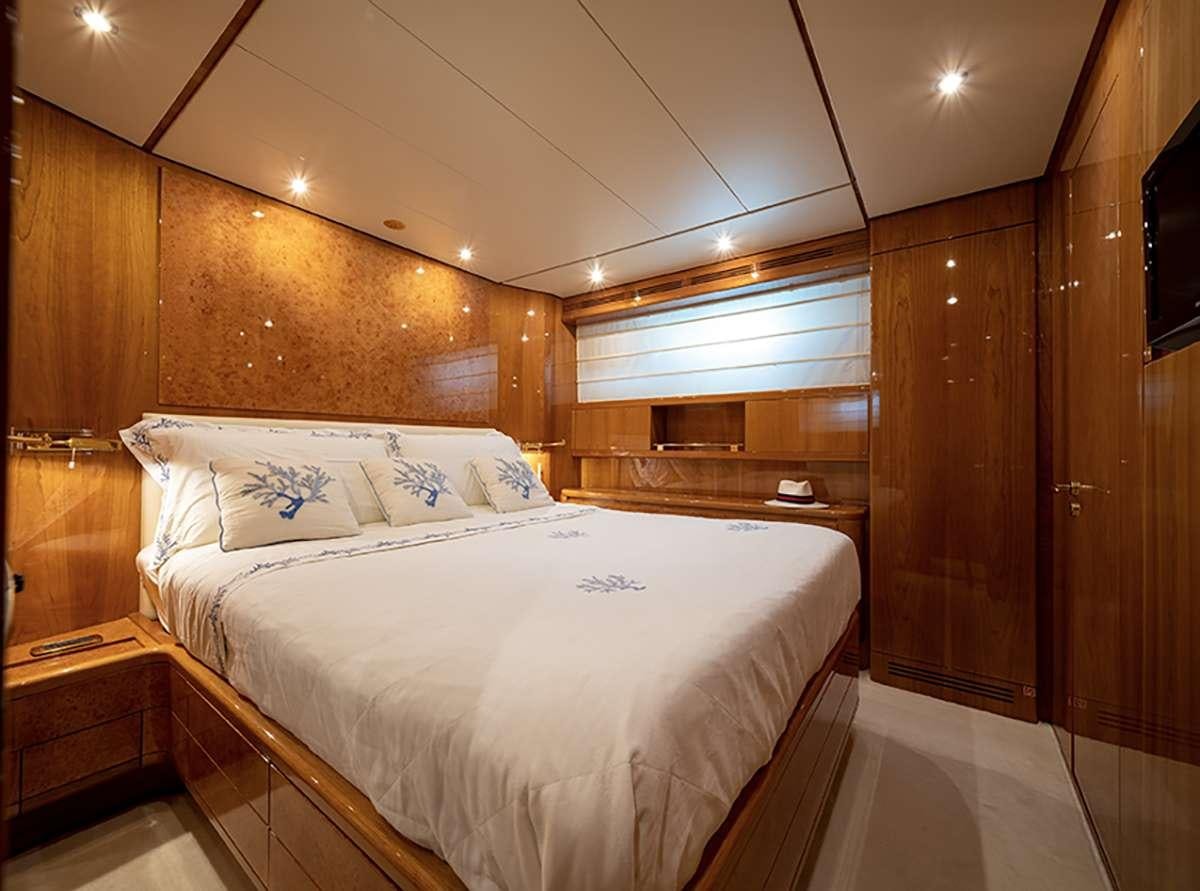 a bed in a room aboard GOLDEN EAGLE Yacht for Charter