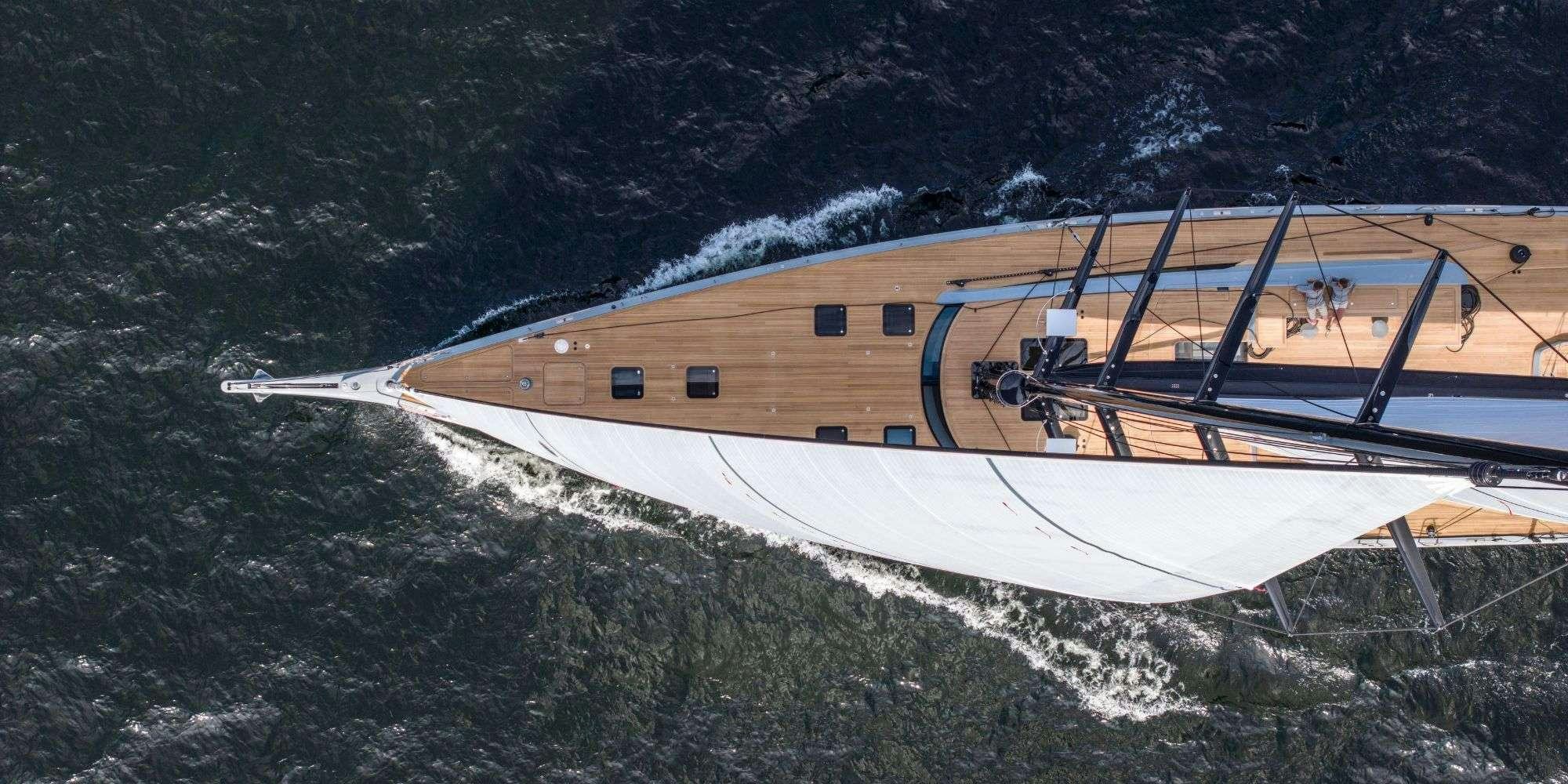 a wooden boat in the water aboard FANCY Yacht for Charter