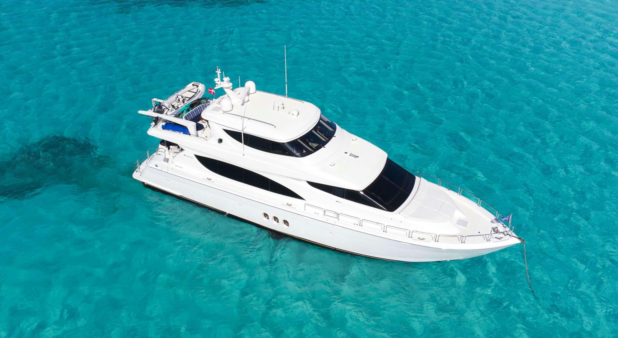 a white boat in the water aboard GAIL FORCE II Yacht for Charter