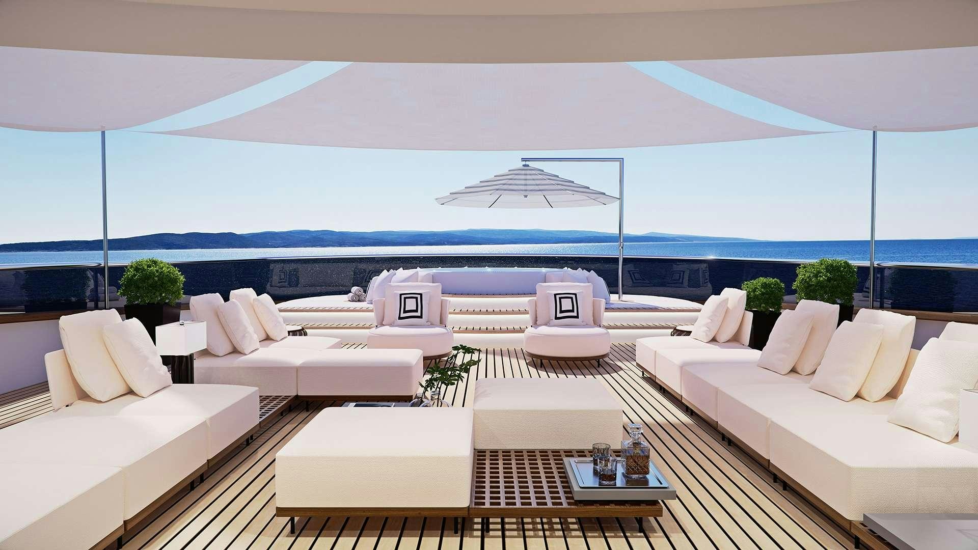 a large white lounge area with a large white lounge chair and a large white lounge chair with a aboard BLACK SWAN Yacht for Charter