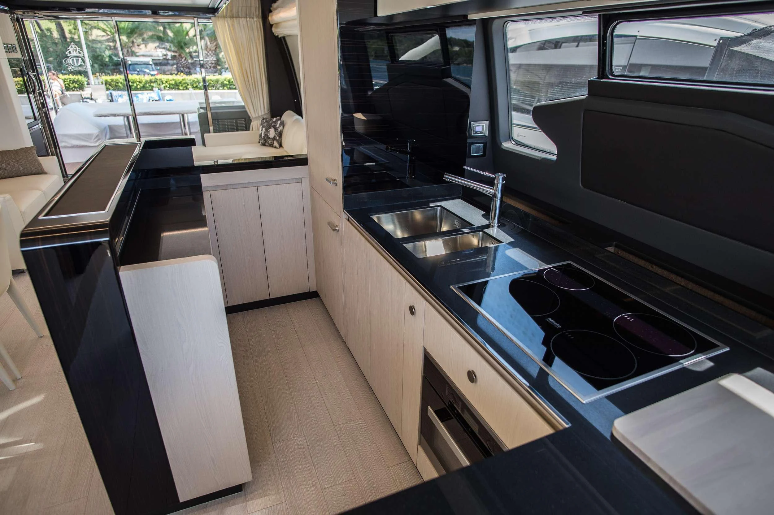 a kitchen with a stove and sink aboard ALYSS Yacht for Charter