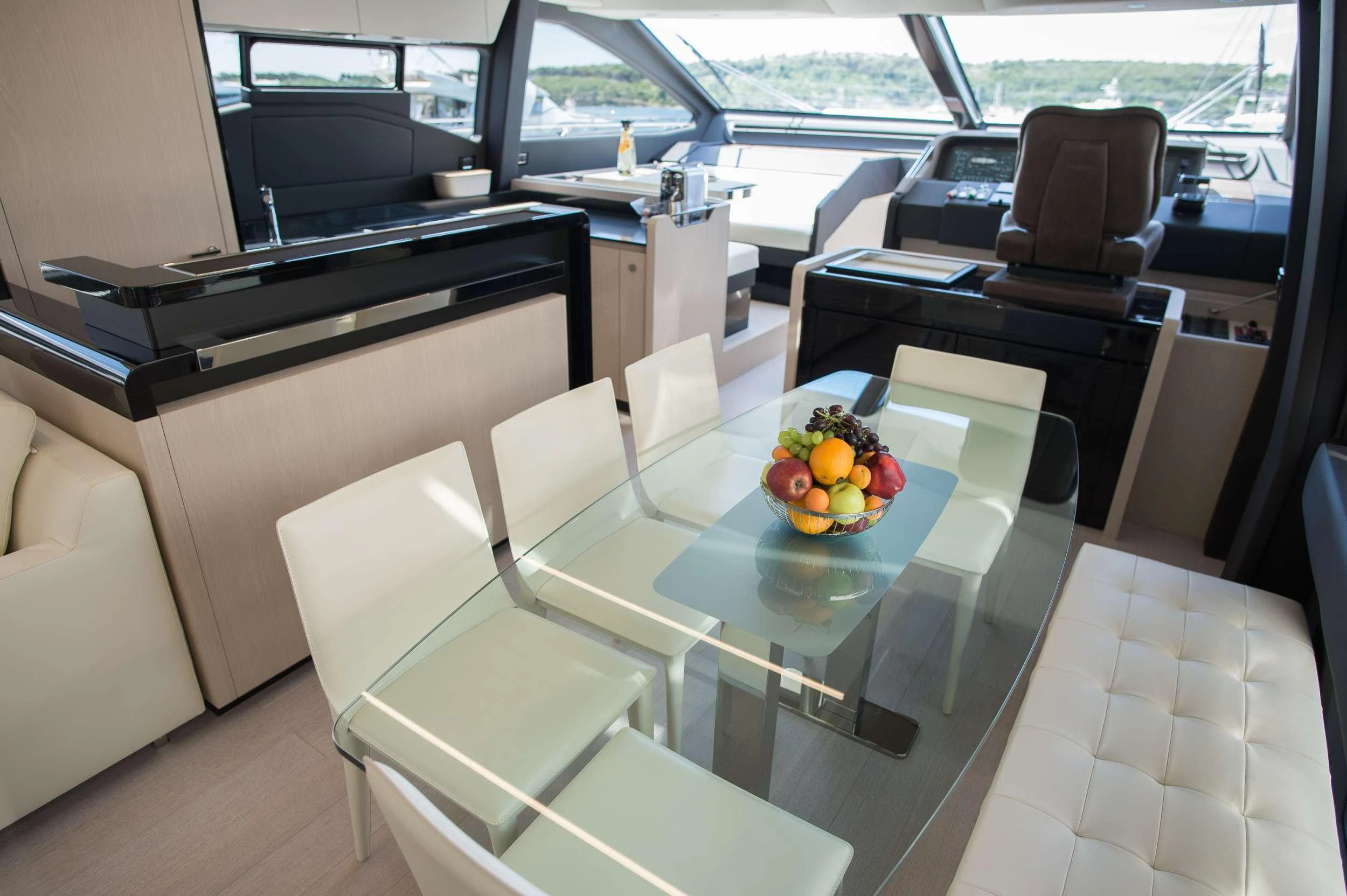 a table with fruit on it aboard ALYSS Yacht for Charter