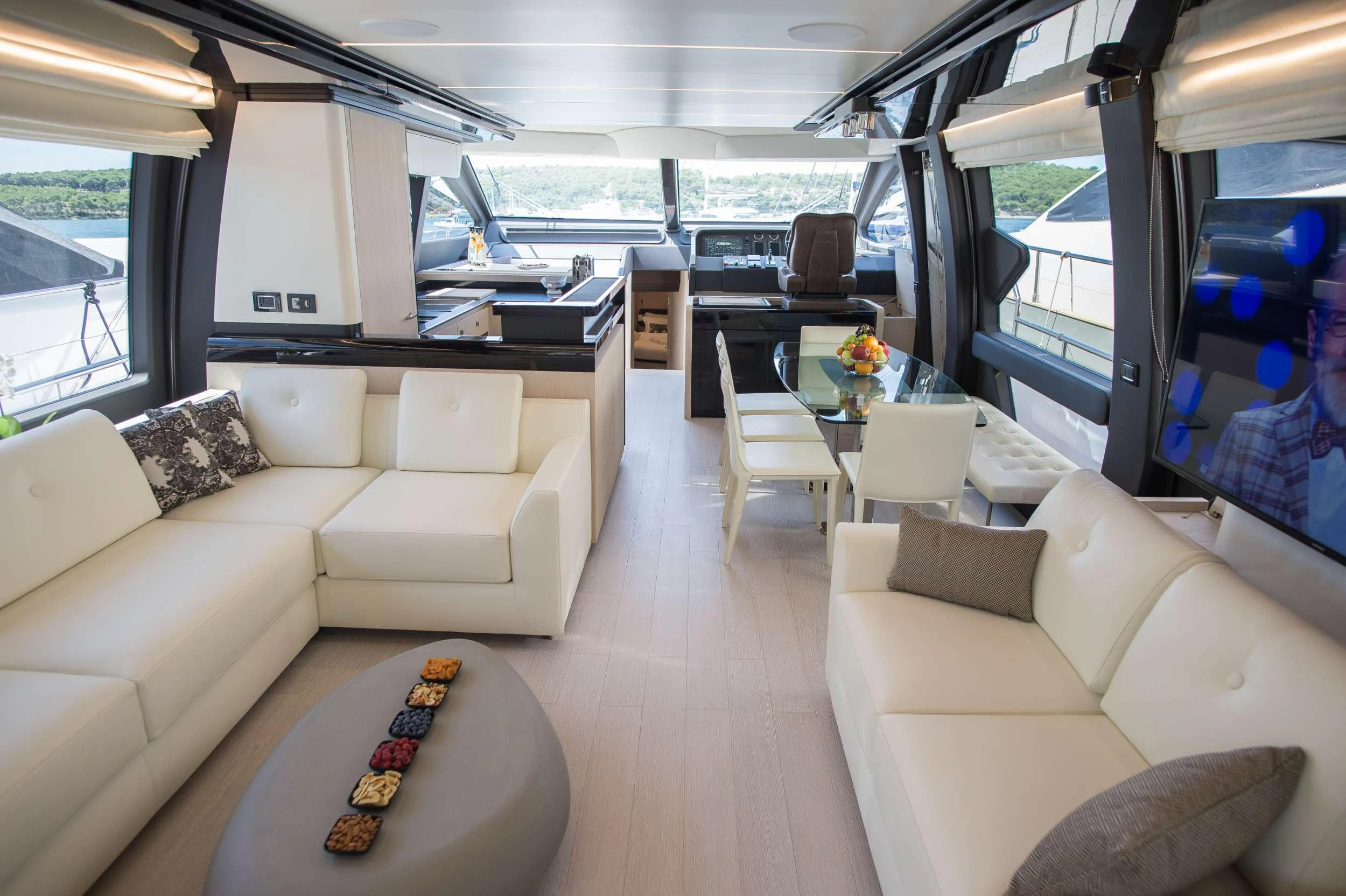 a living room with a couch and a table aboard ALYSS Yacht for Charter