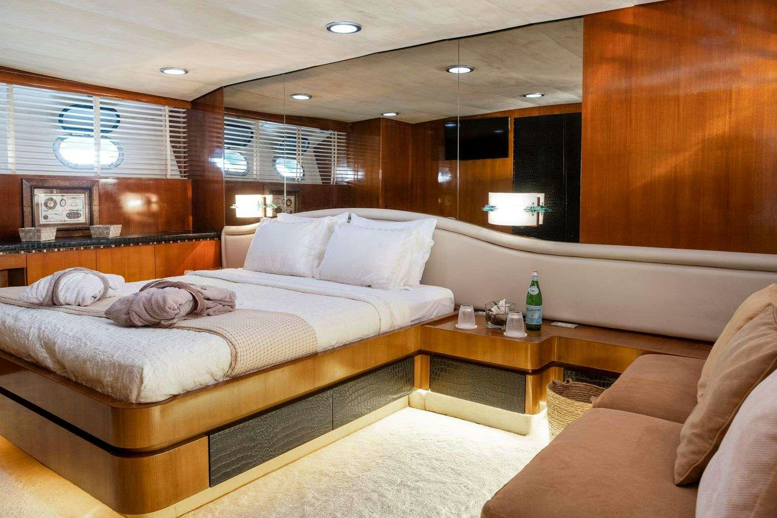 a bed in a room aboard SHIVA Yacht for Charter