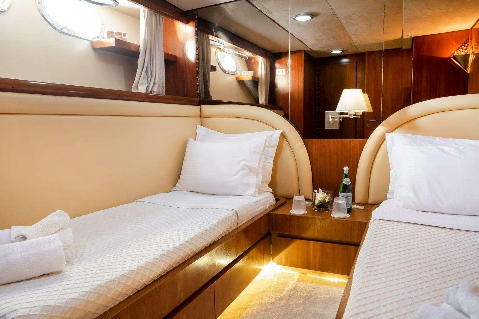 a room with two beds aboard SHIVA Yacht for Charter