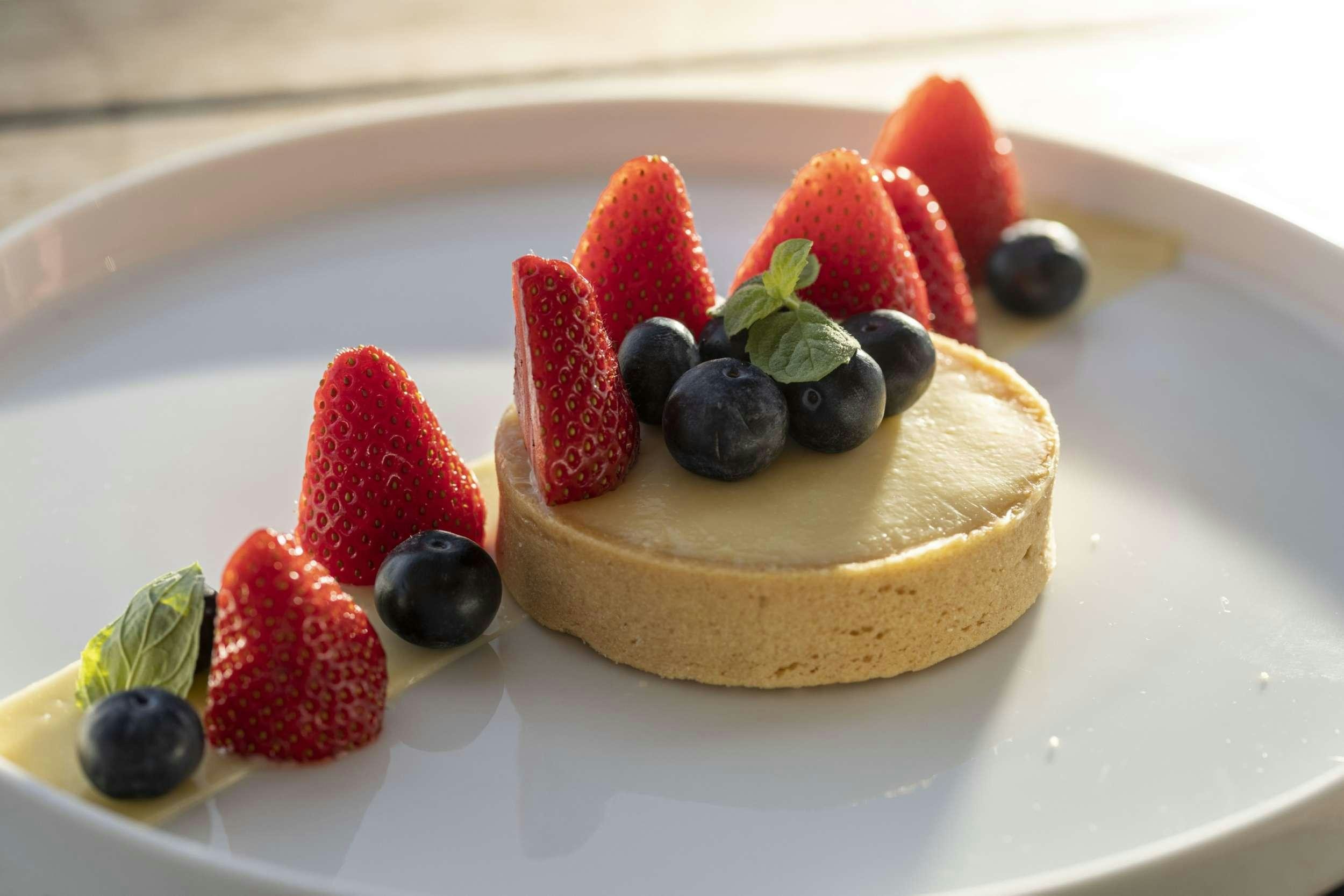 a plate of dessert aboard M/S AURUM SKY Yacht for Charter